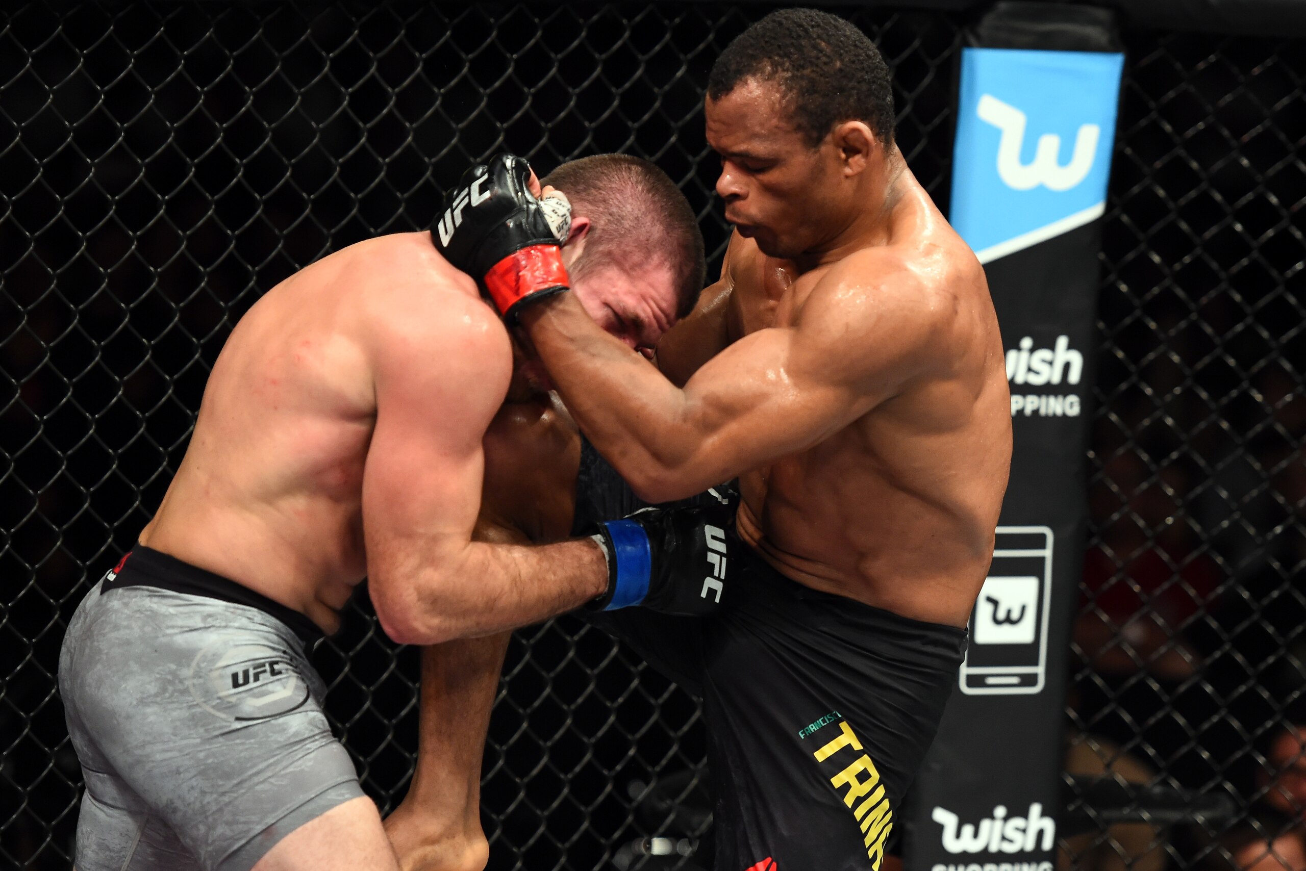 SAO PAULO, BRAZIL - OCTOBER 28:  (R-L) Francisco Trinaldo of Brazil lands a knee against Jim Miller in their lightweight bout during the UFC Fight Night event inside the Ibirapuera Gymnasium on October 28, 2017 in Sao Paulo, Brazil. (Photo by Josh Hedges/
