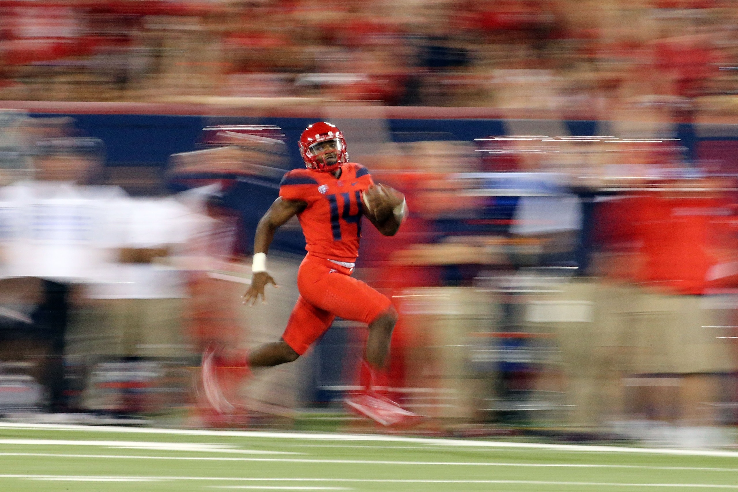 TUCSON, AZ - OCTOBER 28: Quarterback Khalil Tate #14 of the Arizona Wildcats runs during the first half of the college football game against the Washington State Cougars at Arizona Stadium on October 28, 2017 in Tucson, Arizona. (Photo by Chris Coduto/Get