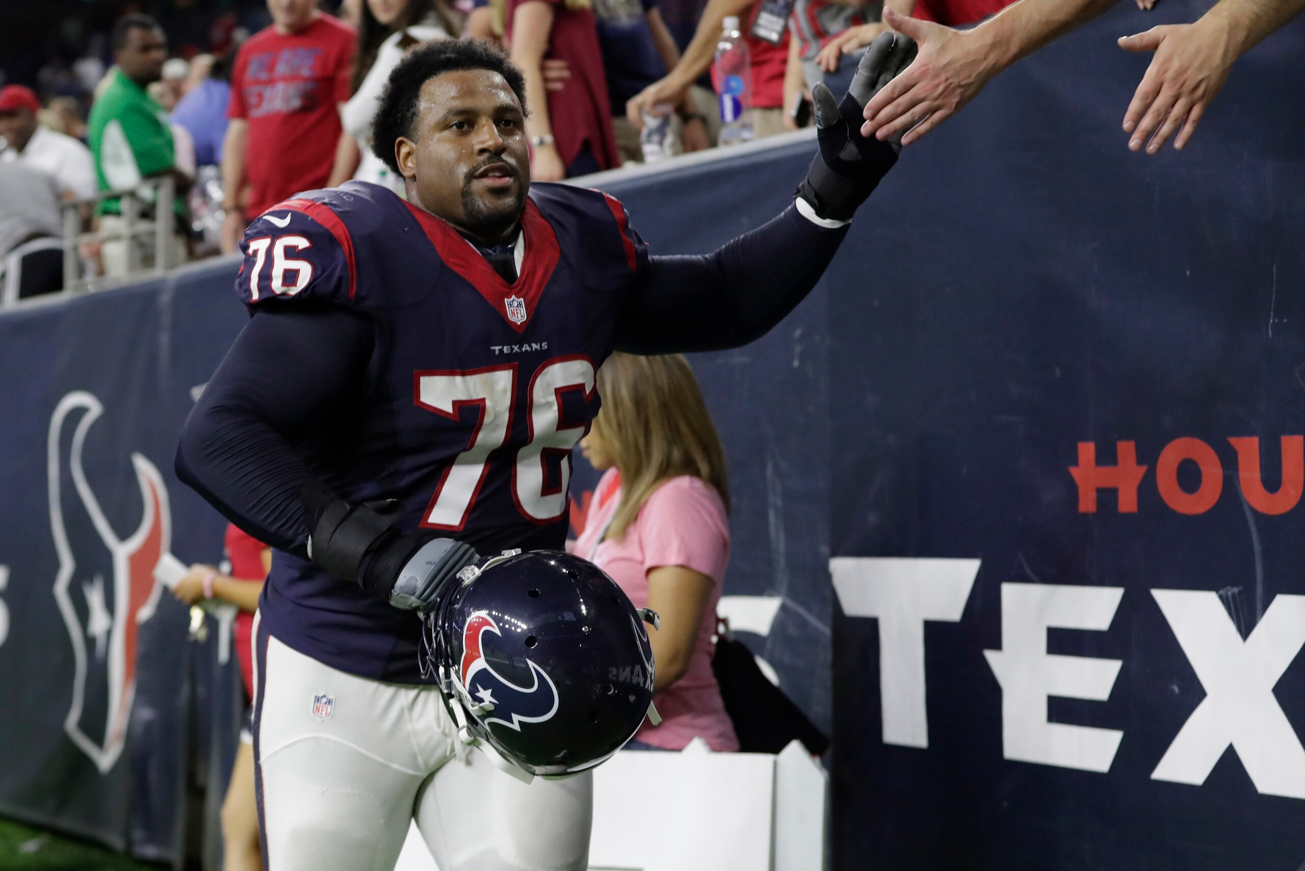 HOUSTON, TX - OCTOBER 16:  Duane Brown #76 of the Houston Texans celebrates with fans after the game against the Indianapolis Colts at NRG Stadium on October 16, 2016 in Houston, Texas.  (Photo by Tim Warner/Getty Images)