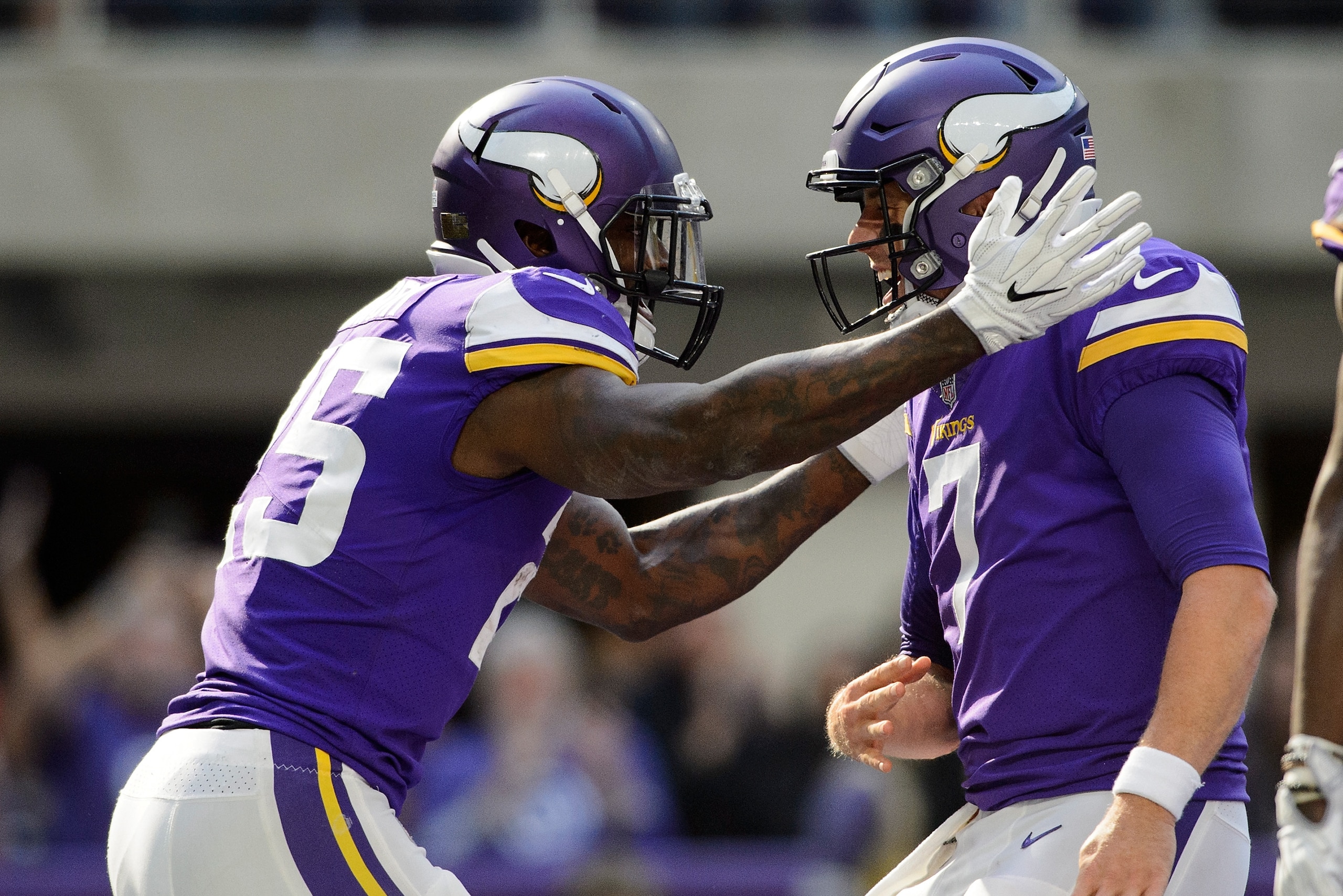 MINNEAPOLIS, MN - OCTOBER 22: Latavius Murray #25 and Case Keenum #7 of the Minnesota Vikings celebrate a touchdown against the Baltimore Ravens during the game on October 22, 2017 at US Bank Stadium in Minneapolis, Minnesota. (Photo by Hannah Foslien/Get