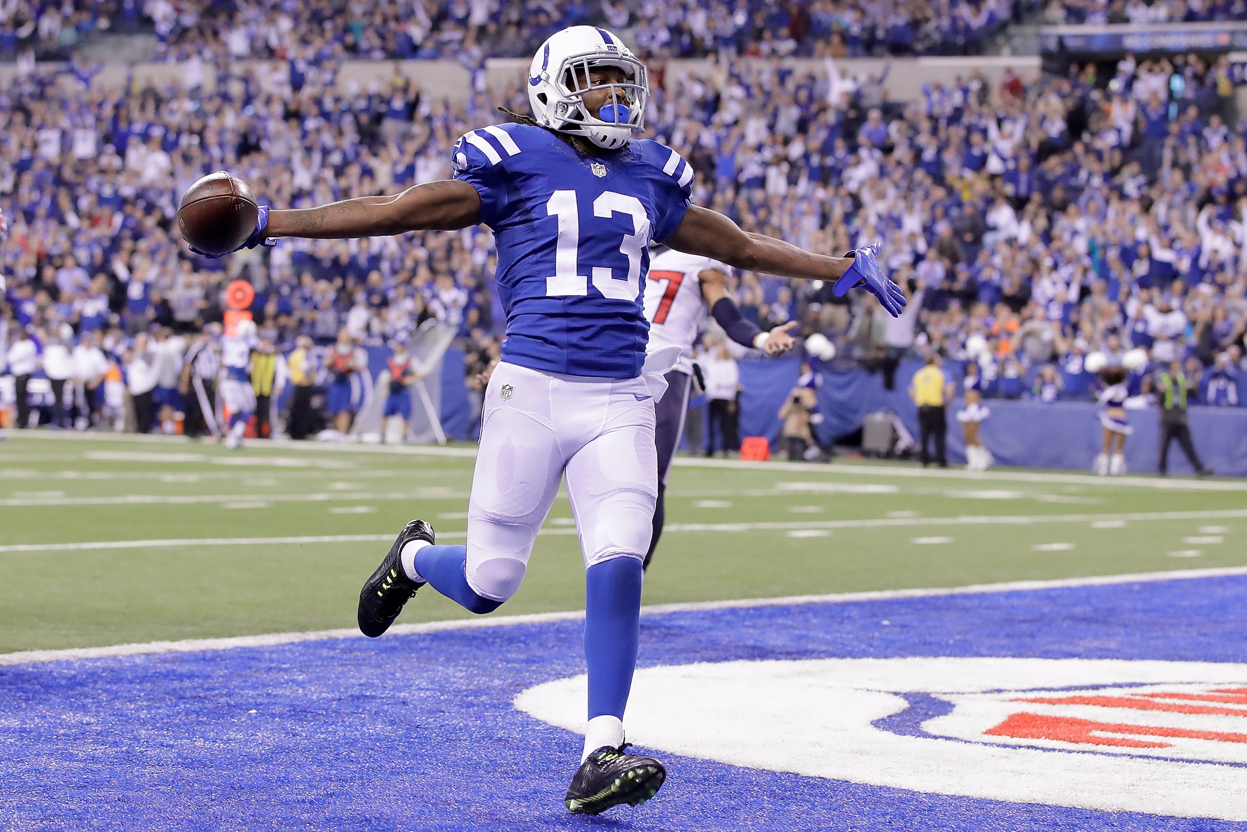 INDIANAPOLIS, IN - DECEMBER 11: T.Y. Hilton #13 of the Indianapolis Colts runs into the endzone for a touchdown during the fourth quarter of the game against the Houston Texans at Lucas Oil Stadium on December 11, 2016 in Indianapolis, Indiana.  (Photo by