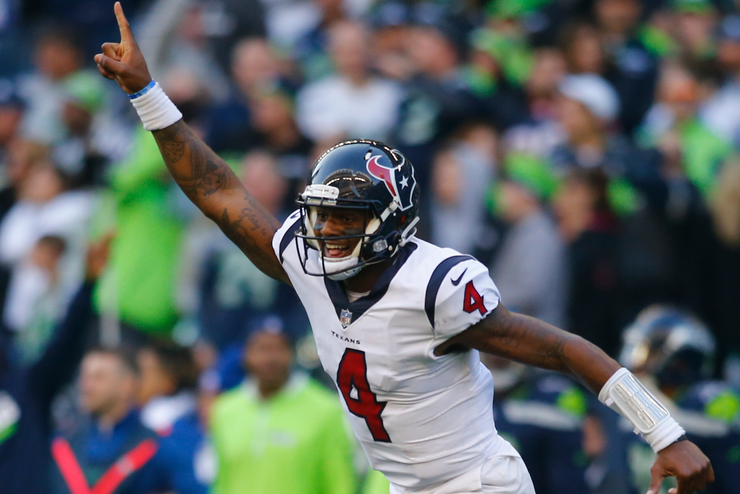 SEATTLE, WA - OCTOBER 29:  Quarterback Deshaun Watson #4 of the Houston Texans cheers as DeAndre Hopkins #10 scores a 72 yard touchdown against the Seattle Seahawks in the fourth quarter at CenturyLink Field on October 29, 2017 in Seattle, Washington. (Ph