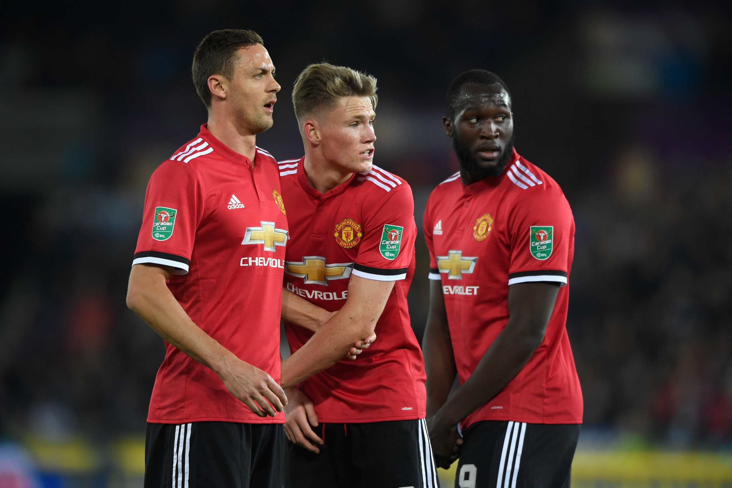 SWANSEA, WALES - OCTOBER 24: Nemanja Matic (l) Scott McTominay and Romelu Lukaku of United in the defensive wall during the Carabao Cup Fourth Round match between Swansea City and Manchester United at Liberty Stadium on October 24, 2017 in Swansea, Wales.