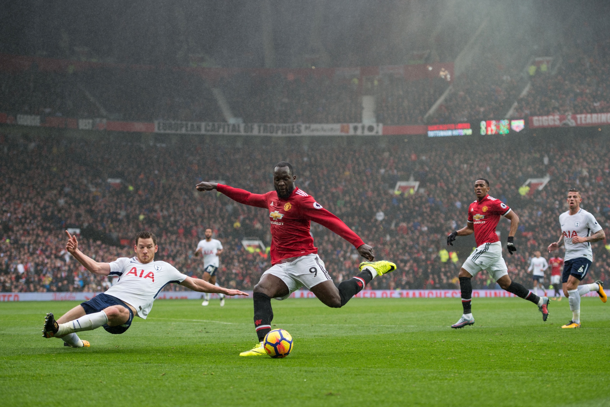 Manchester United's Belgian striker Romelu Lukaku (C) takes a shot at goal during the English Premier League football match between Manchester United and Tottenham Hotspur at Old Trafford in Manchester, north west England, on October 28, 2017.
Manchester 