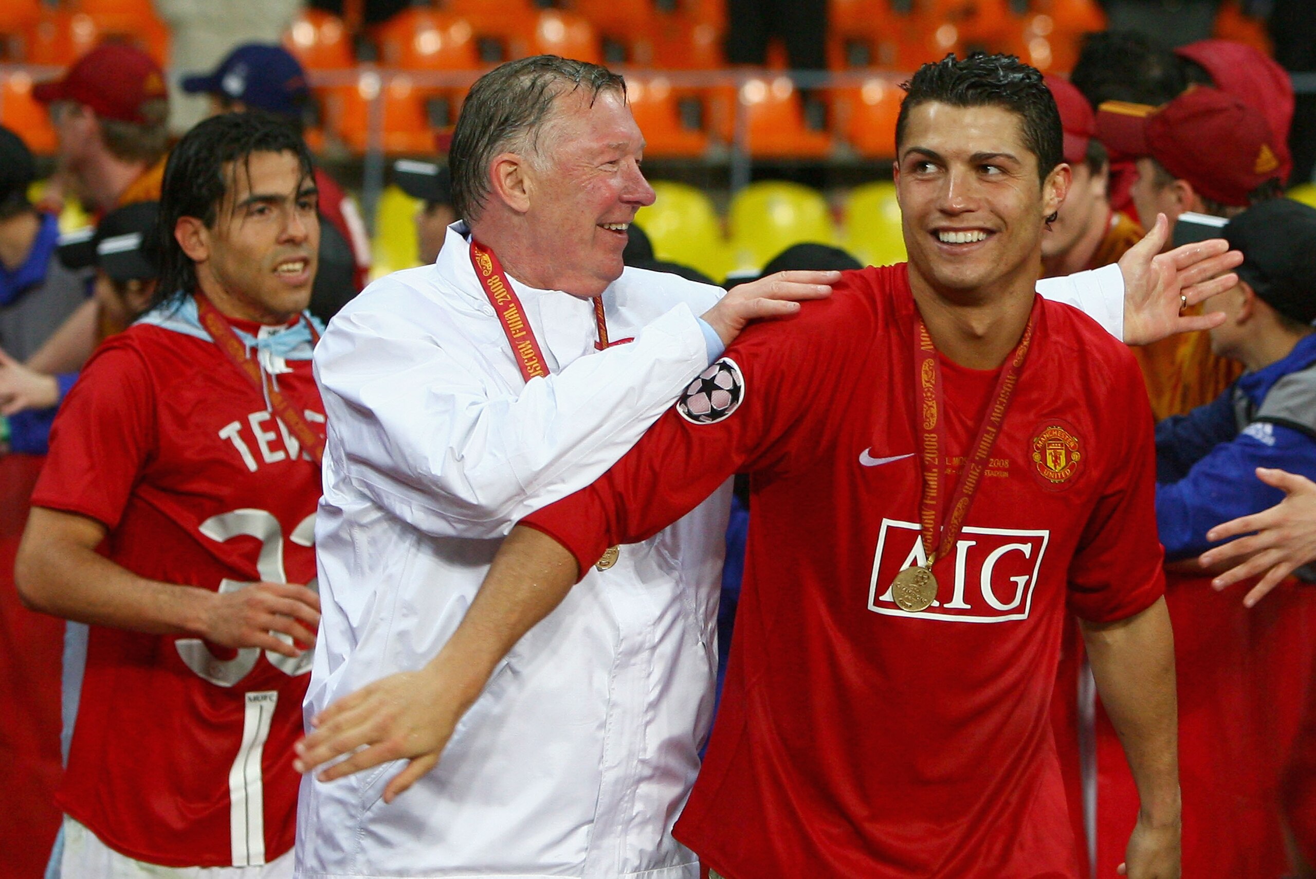 MOSCOW - MAY 21:  Manchester United manager Sir Alex Ferguson (C) smiles with Cristiano Ronaldo of Manchester United after the UEFA Champions League Final match between Manchester United and Chelsea at the Luzhniki Stadium on May 21, 2008 in Moscow, Russi