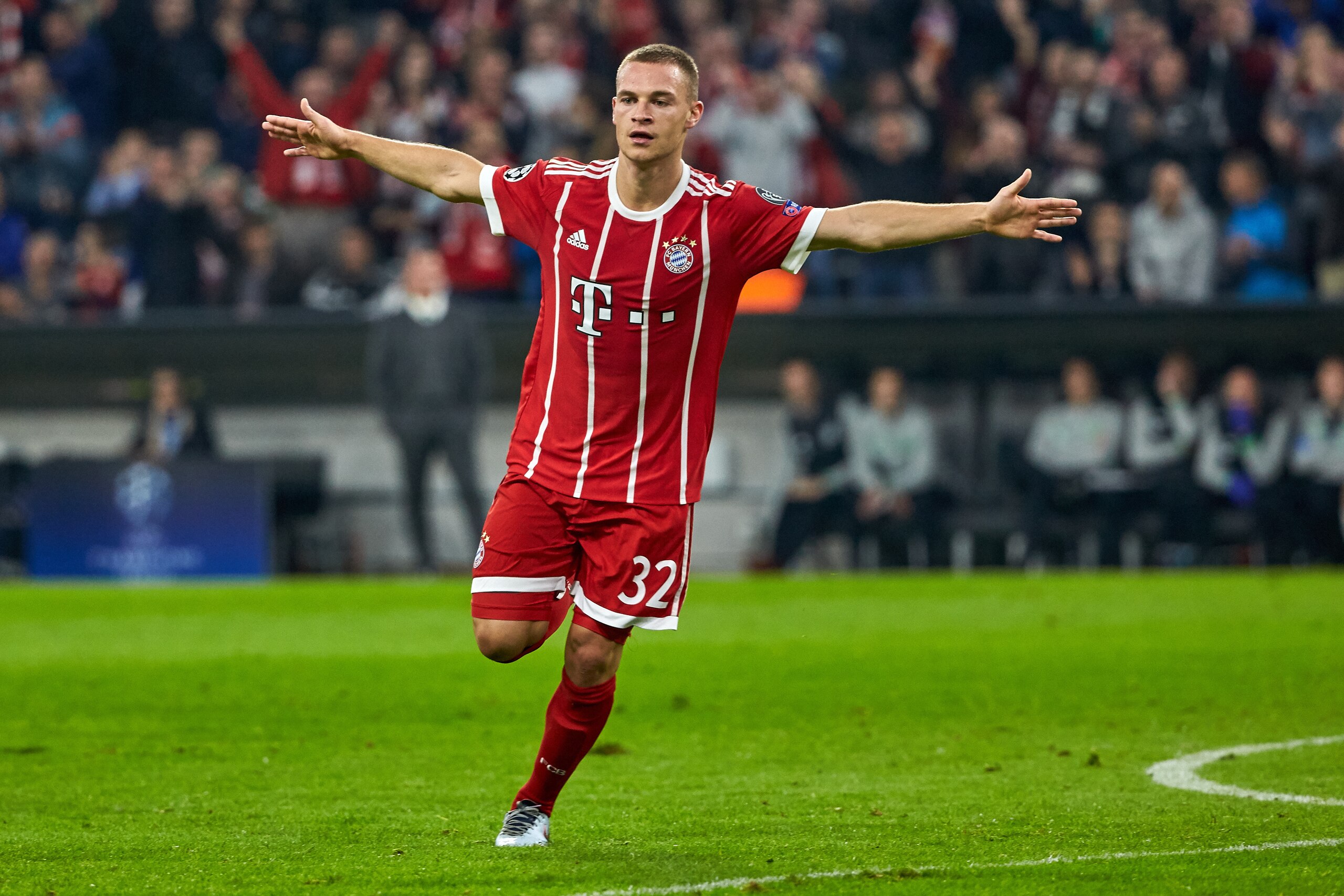 MUNICH, GERMANY - OCTOBER 18: Joshua Kimmich of Bayern Muenchen celebrates after scoring his team`s second goal during the UEFA Champions League group B match between Bayern Muenchen and Celtic FC at Allianz Arena on October 18, 2017 in Munich, Germany. (