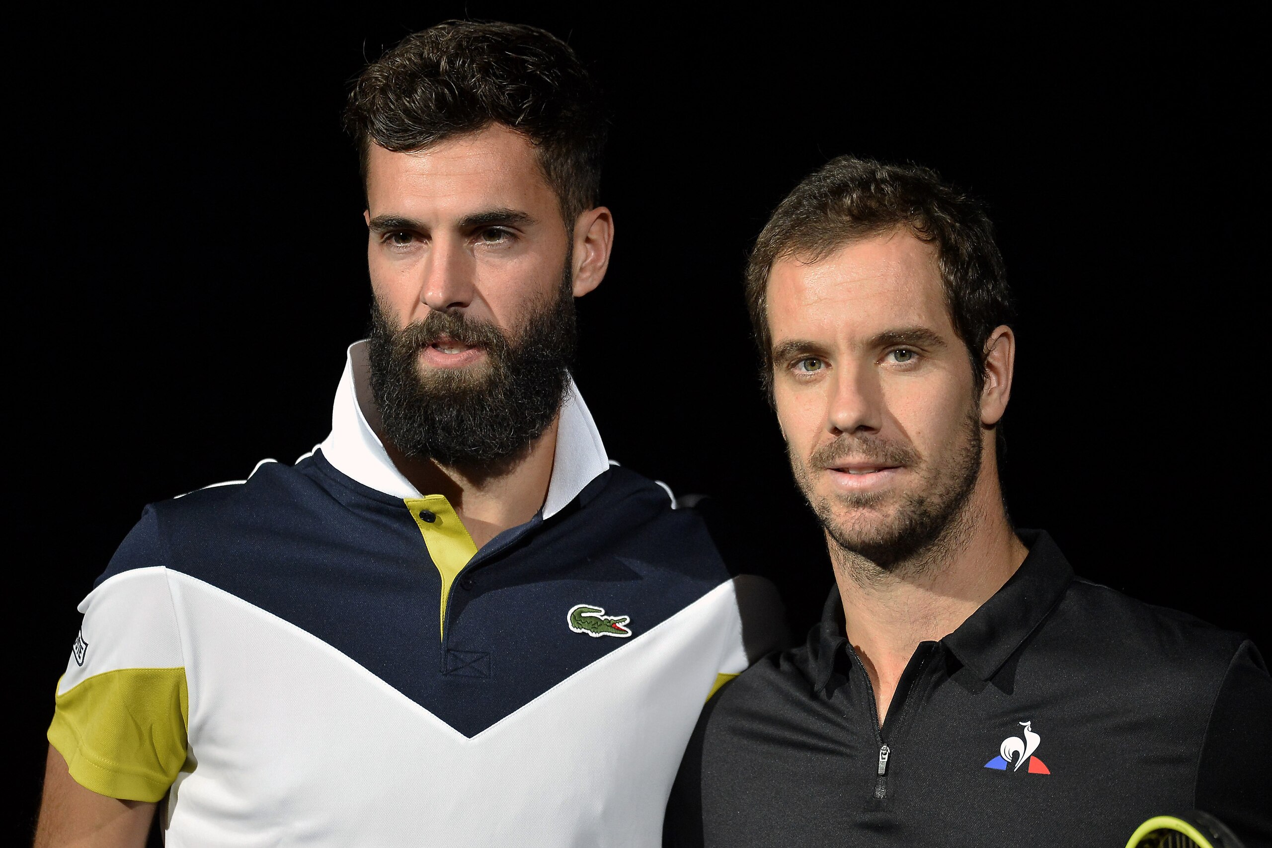 PARIS, FRANCE - OCTOBER 30:  Benoit Paire (L) of France and Richard Gasquet of France pose for photographers before the men's single against  on the first round match of the Rolex Paris Masters at Palais Omnisports de Bercy on October 30, 2017 in Paris, F