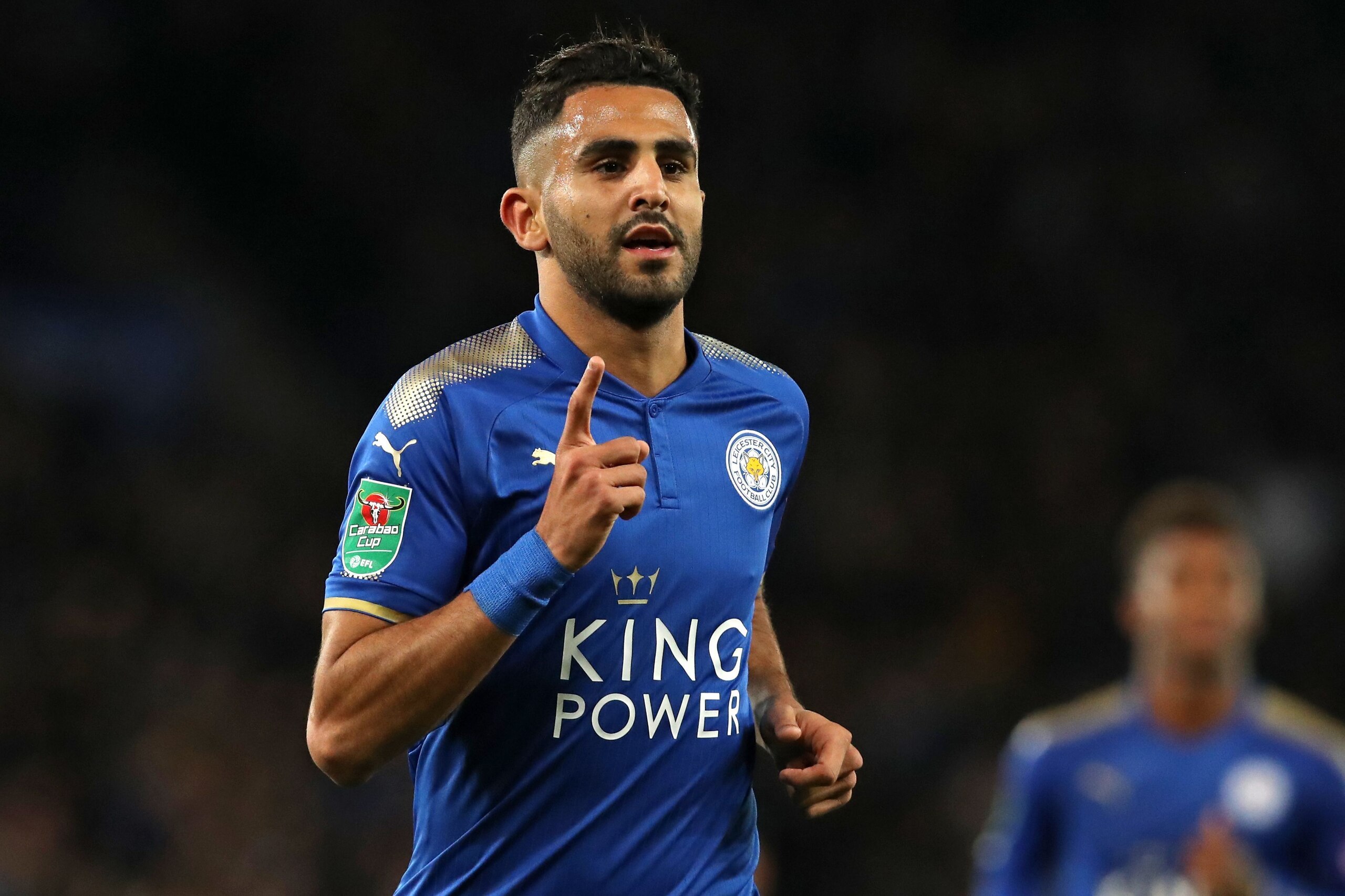 Leicester City's Algerian midfielder Riyad Mahrez celebrates after scoring their third goal during the English League Cup fourth round football match between Leicester City and Leeds United at King Power Stadium in Leicester, central England on October 24