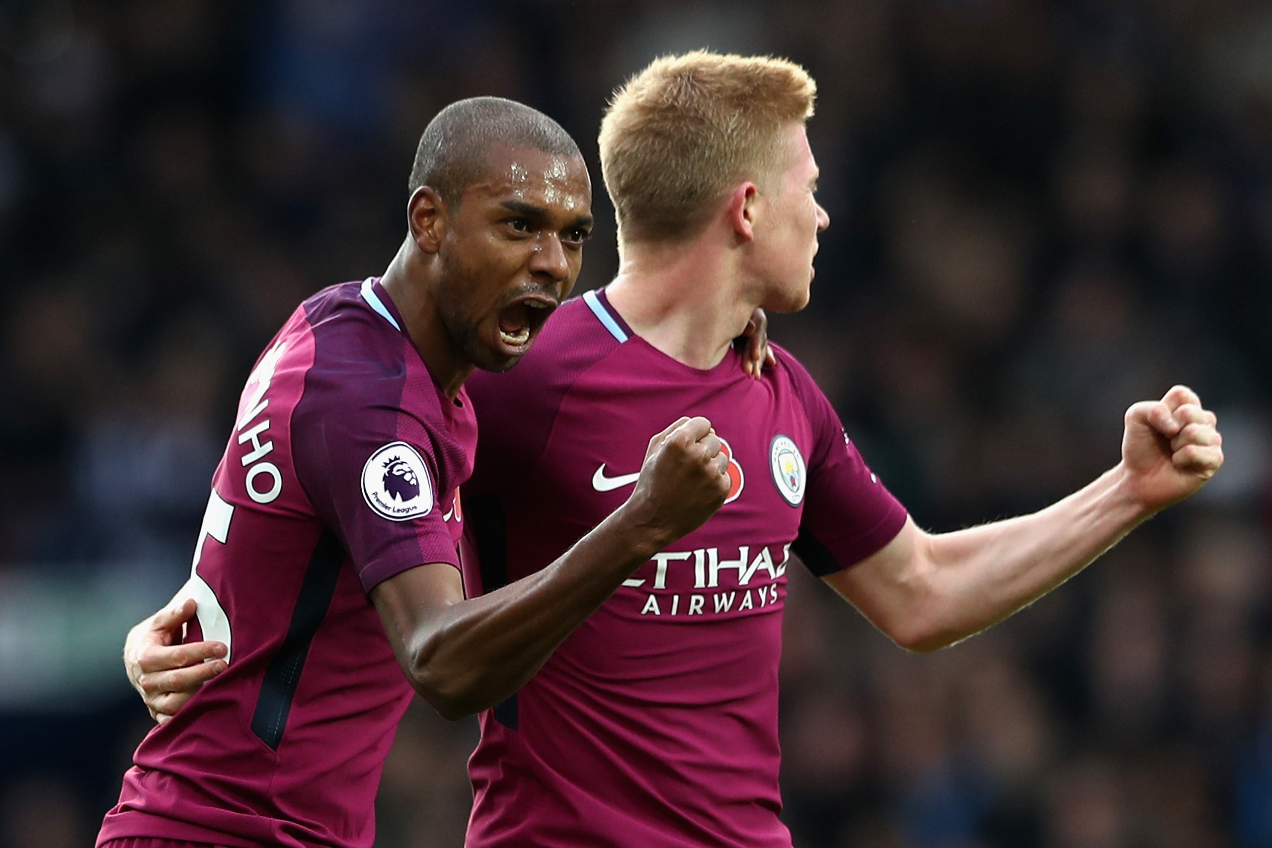 WEST BROMWICH, ENGLAND - OCTOBER 28:  Fernandinho of Manchester City celebrates scoring his sides second goal with Kevin De Bruyne of Manchester City during the Premier League match between West Bromwich Albion and Manchester City at The Hawthorns on Octo