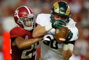 TUSCALOOSA, AL - SEPTEMBER 16:  Dalton Fackrell #30 of the Colorado State Rams pulls in this reception against Minkah Fitzpatrick #29 of the Alabama Crimson Tide at Bryant-Denny Stadium on September 16, 2017 in Tuscaloosa, Alabama.  (Photo by Kevin C. Cox