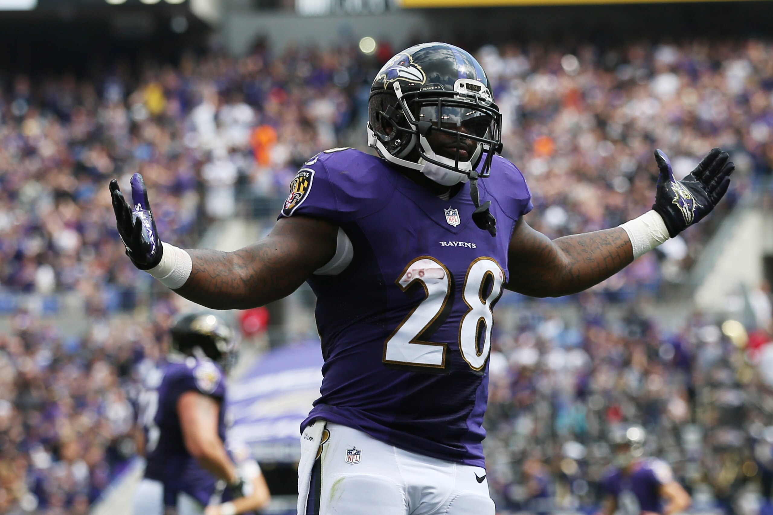 BALTIMORE, MD - SEPTEMBER 17: Running back Terrance West #28 of the Baltimore Ravens celebrates his touchdown against the Cleveland Browns in the first quarter at M&T Bank Stadium on September 17, 2017 in Baltimore, Maryland.  (Photo by Patrick Smith/Gett