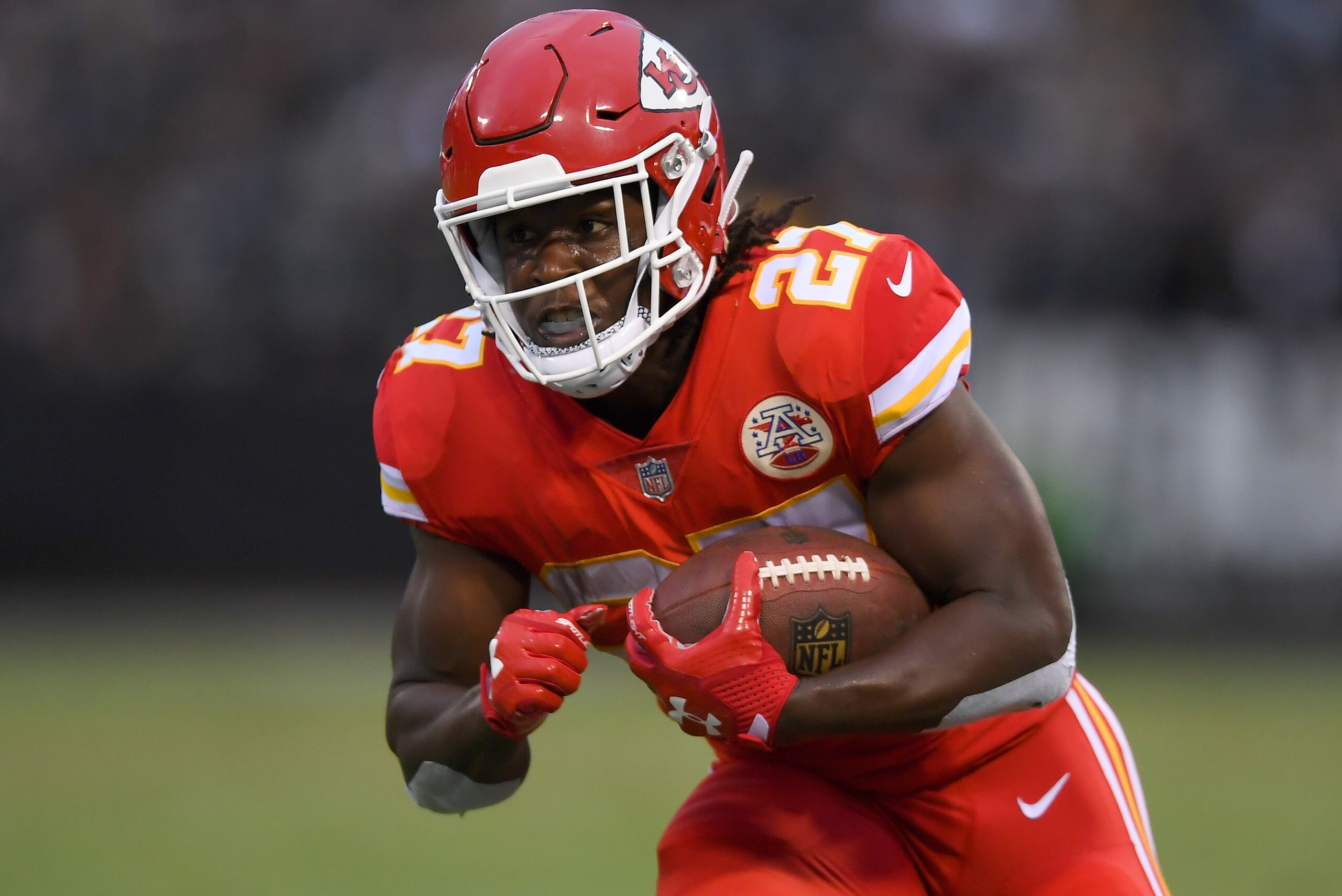 OAKLAND, CA - OCTOBER 19:  Kareem Hunt #27 of the Kansas City Chiefs carries the ball against the Oakland Raiders during their NFL football game at Oakland-Alameda County Coliseum on October 19, 2017 in Oakland, California.  (Photo by Thearon W. Henderson