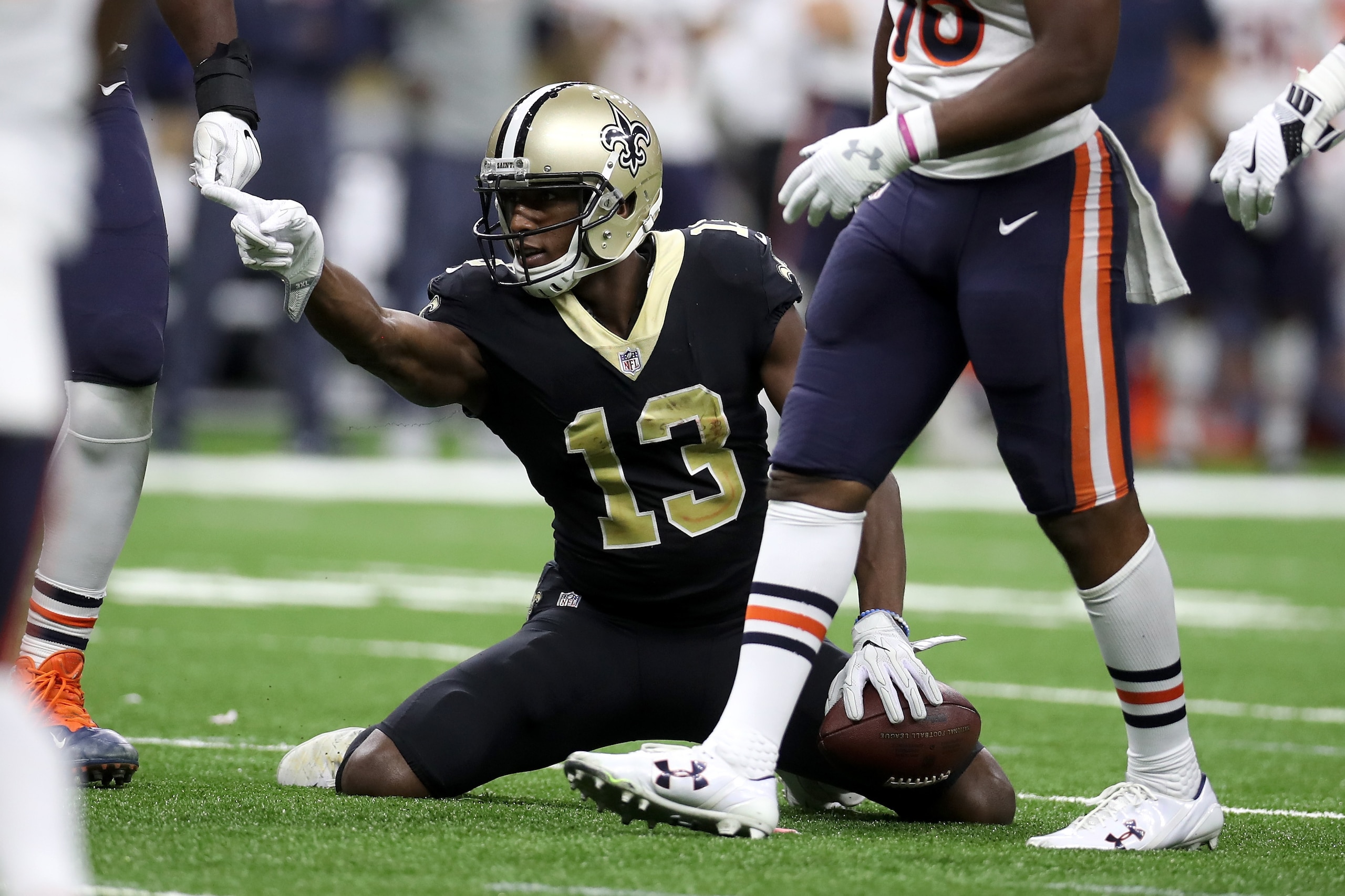 NEW ORLEANS, LA - OCTOBER 29:   Michael Thomas #13 of the New Orleans Saints signals a first down against the New Orleans Saints at the Mercedes-Benz Superdome on October 29, 2017 in New Orleans, Louisiana.  (Photo by Chris Graythen/Getty Images)