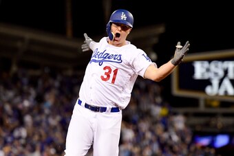 LOS ANGELES, CA - OCTOBER 31:  Joc Pederson #31 of the Los Angeles Dodgers celebrates as he runs the bases after hitting a solo home run during the seventh inning against the Houston Astros in game six of the 2017 World Series at Dodger Stadium on October