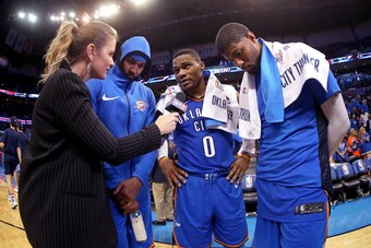 OKLAHOMA CITY, OK- OCTOBER 19:  Russell Westbrook #0, Carmelo Anthony #7 and Paul George #13 of the Oklahoma City Thunder talk to the media after the game against the New York Knicks on October 19, 2017 at Chesapeake Energy Arena in Oklahoma City, Oklahom
