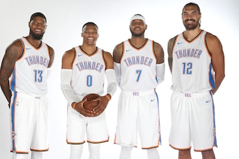 OKLAHOMA CITY, OK - SEPTEMBER 25: Paul George #13, Russell Westbrook #0, Carmelo Anthony #7 and Steven Adams #12 of the Oklahoma City Thunder pose for a portrait during the 2017 NBA Media Day on September 25, 2017 at the Chesapeake Energy Arena in Oklahom