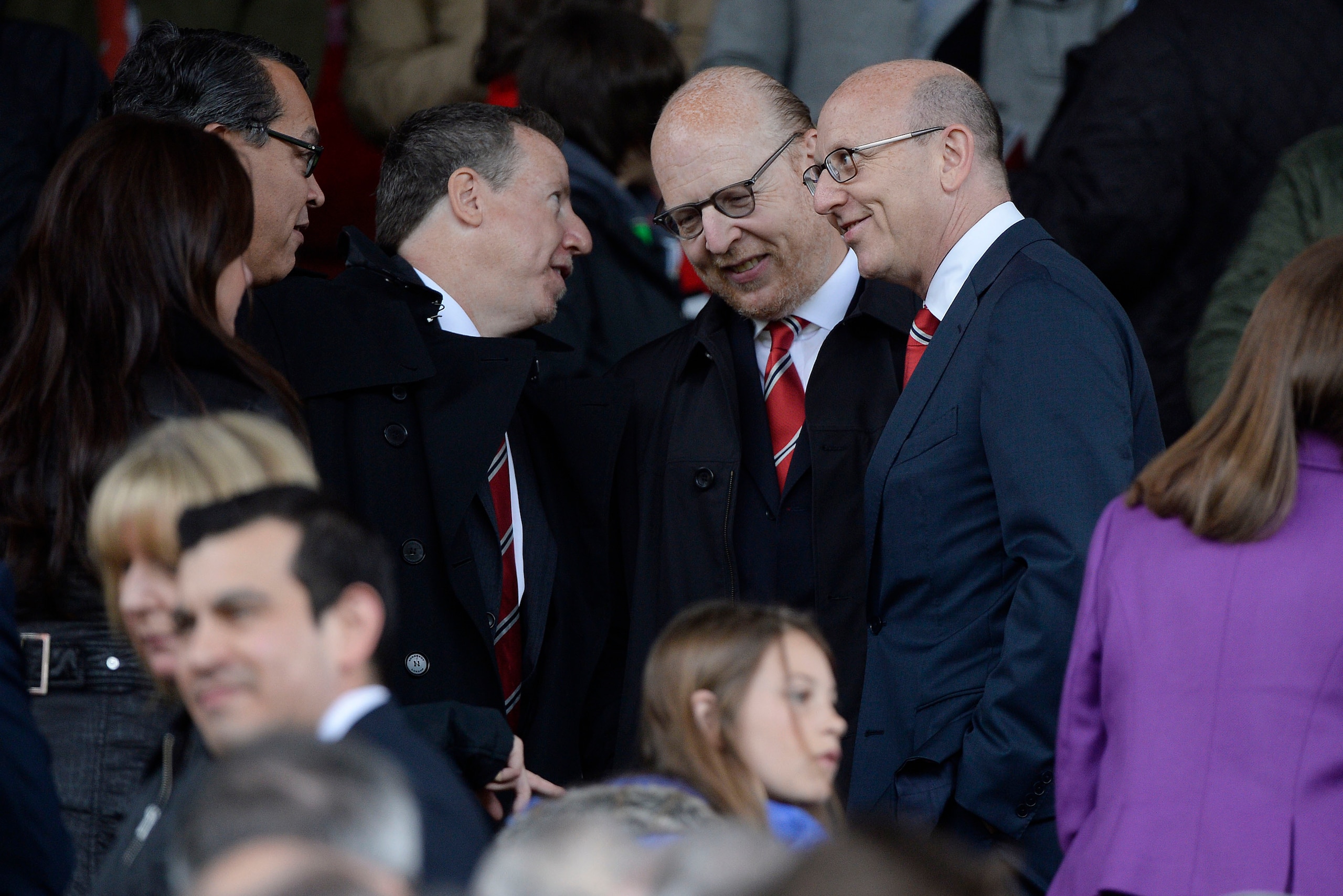 MANCHESTER, UNITED KINGDOM - MAY 12:  The three Glazer brothers in the directors box before the Manchester United versus Swansea City FA Premier League match, the final home game for Sir Alex Ferguson as United manager, at Old Trafford on May 12th 2013 in