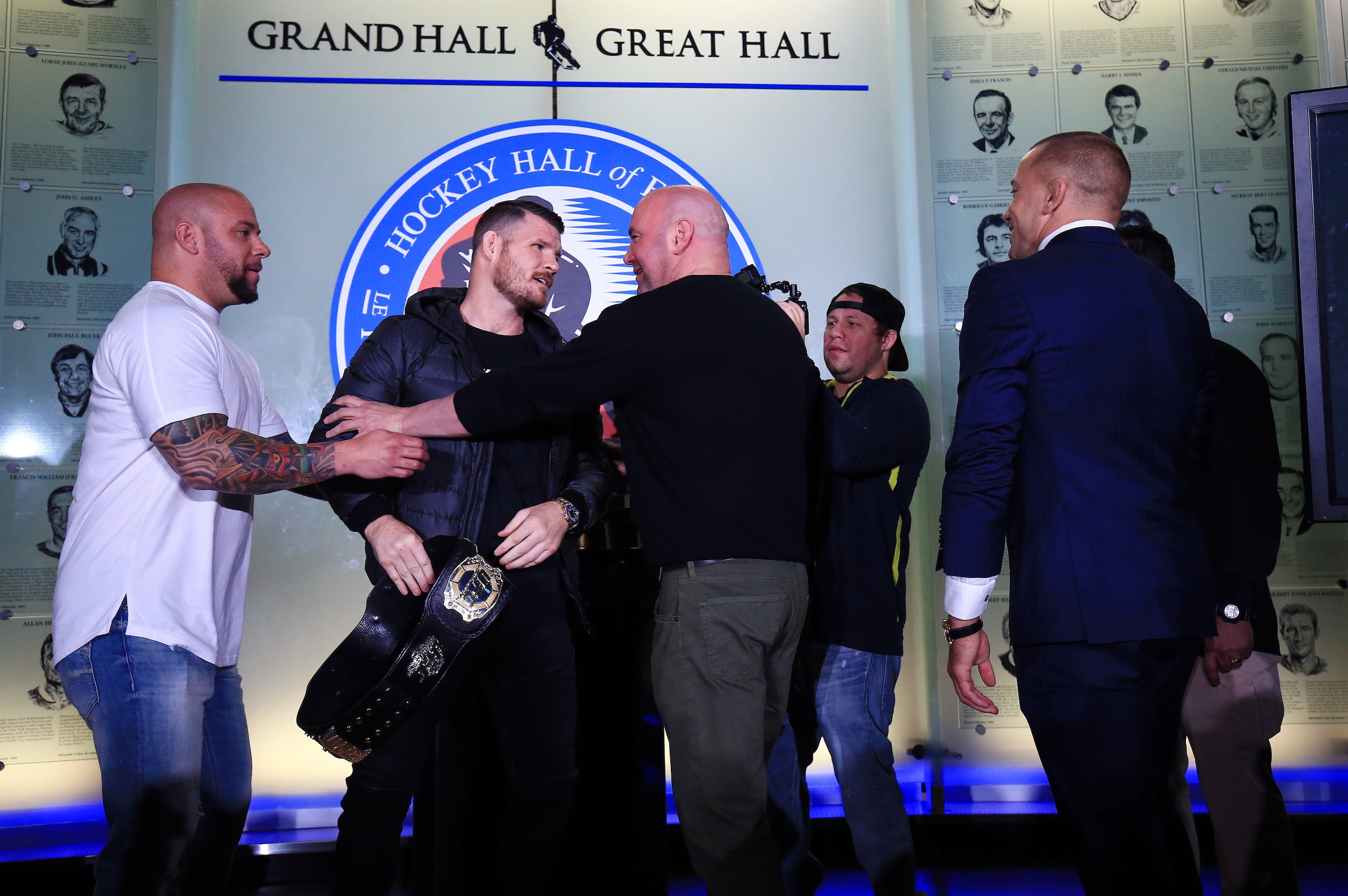TORONTO, ON - OCTOBER 13:  Michael Bisping and Georges St-Pierre face off following the UFC 217 press conference with Dana White at the Hockey Hall of Fame on October 13, 2017 in Toronto, Canada.  (Photo by Vaughn Ridley/Zuffa LLC/Zuffa LLC via Getty Imag