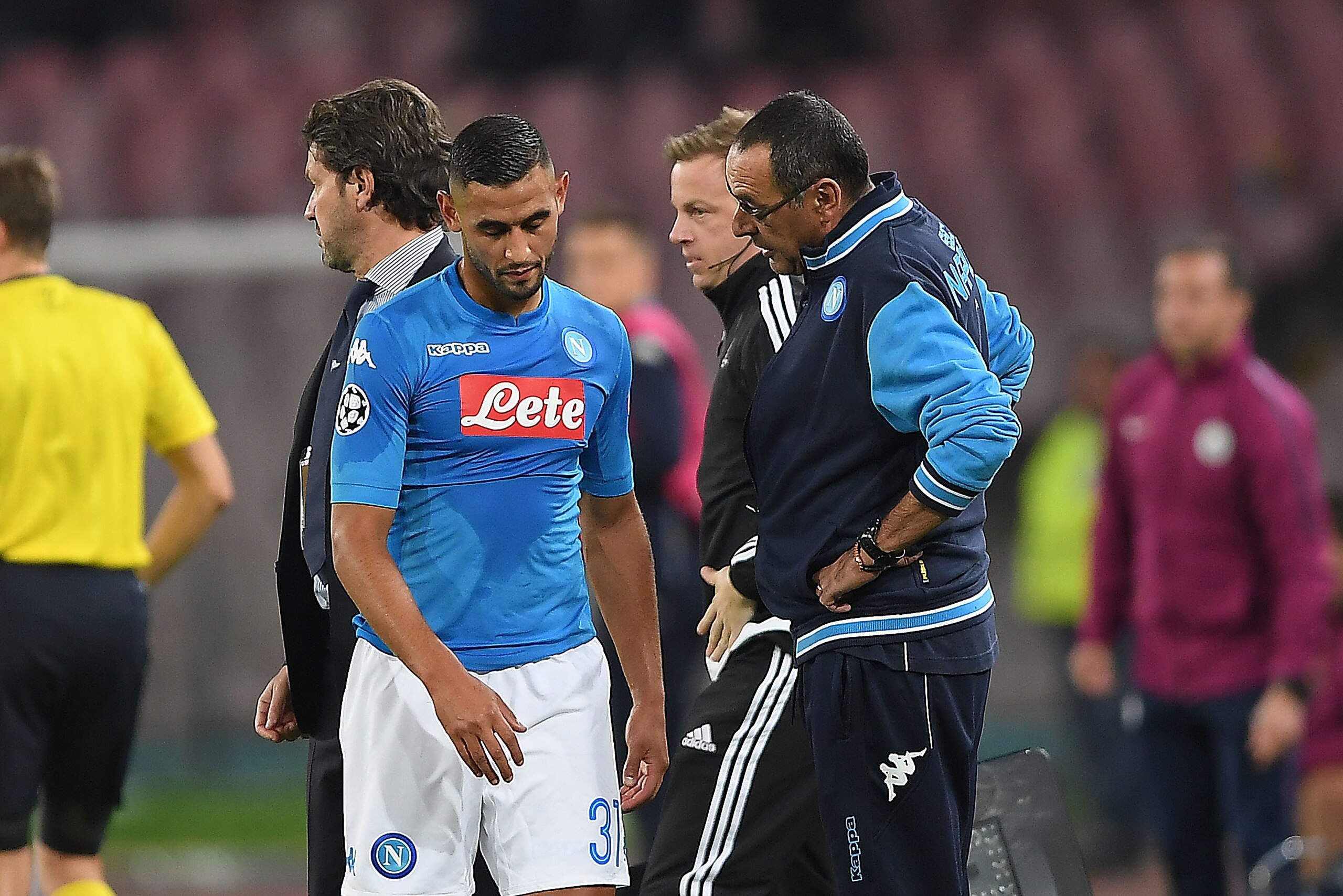 NAPLES, ITALY - NOVEMBER 01:  Coach of SSC Napoli Maurizio Sarri and injured player Faouzi Ghoulam during the UEFA Champions League group F match between SSC Napoli and Manchester City at Stadio San Paolo on November 1, 2017 in Naples, Italy.  (Photo by F