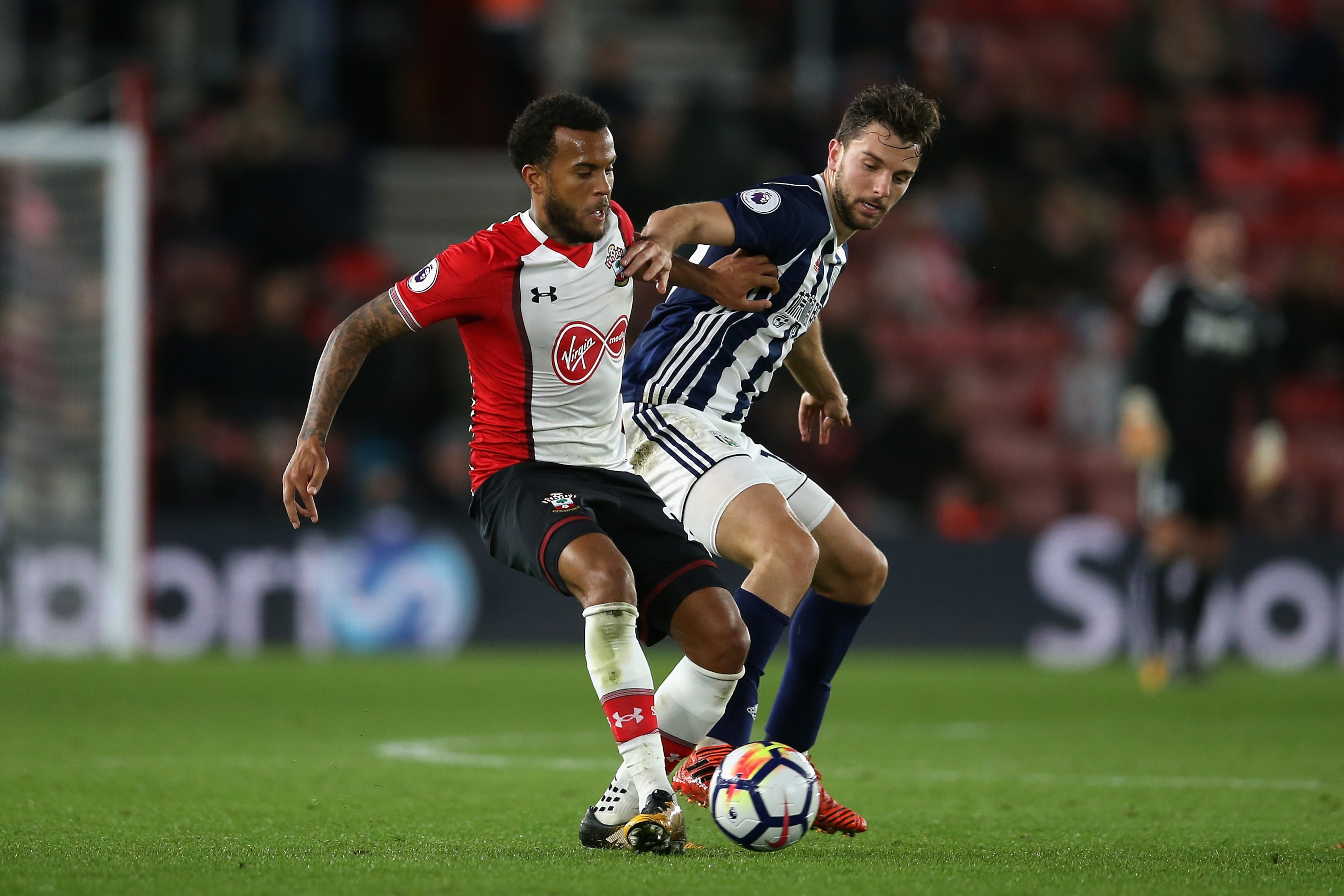 SOUTHAMPTON, ENGLAND - OCTOBER 21: Ryan Bertrand of Southampton and Jay Rodriguez of West Bromwich Albion battle for possession during the Premier League match between Southampton and West Bromwich Albion at St Mary's Stadium on October 21, 2017 in Southa