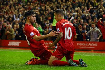 LIVERPOOL, ENGLAND - NOVEMBER 08:  Philippe Coutinho of Liverpool (r) celebrates scoring his side's first goal with Emre Can of Liverpool during the Barclays Premier League match between Liverpool and Crystal Palace at Anfield on November 8, 2015 in Liver