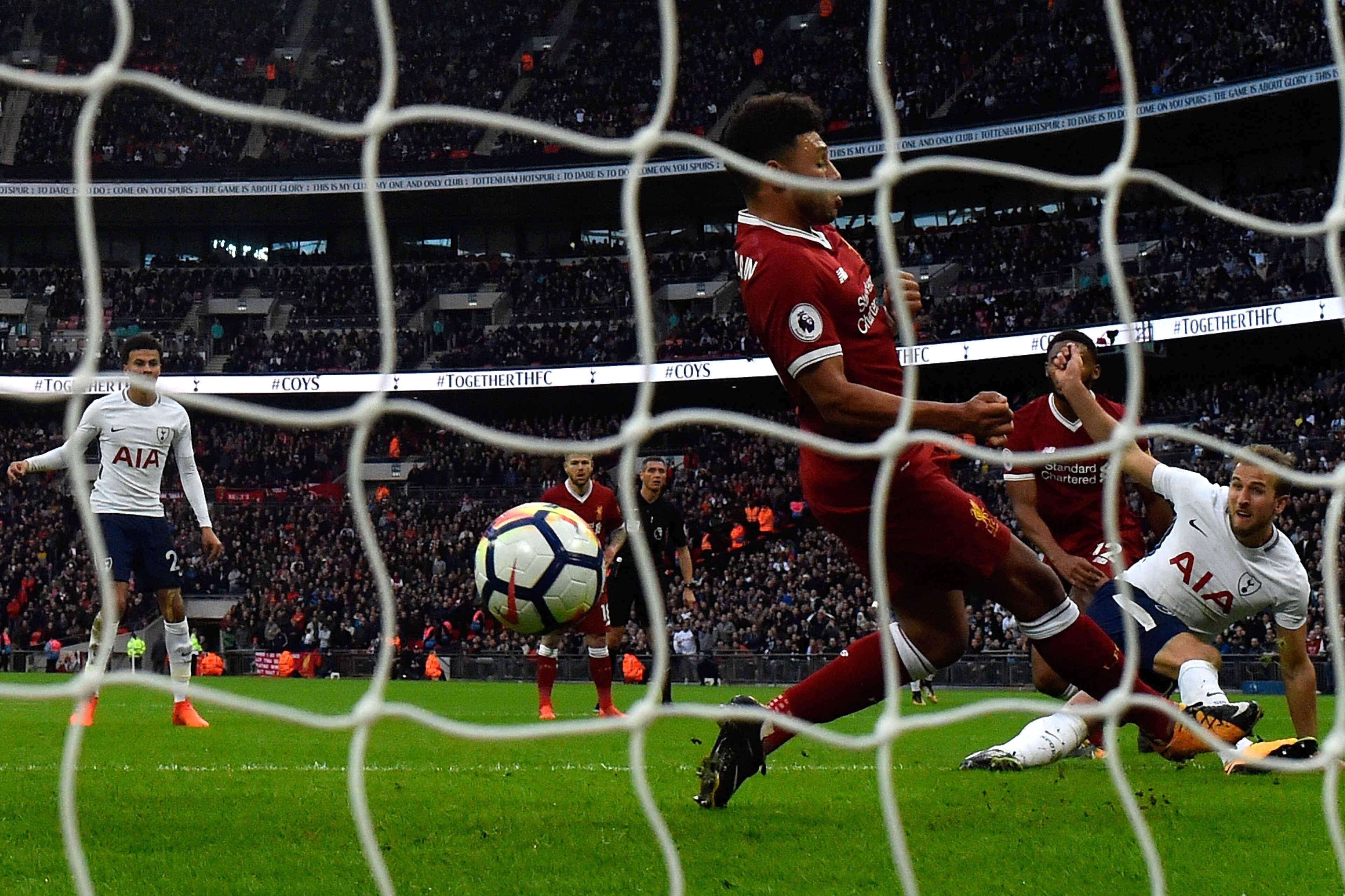 LONDON, ENGLAND - OCTOBER 22:  Harry Kane of Tottenham Hotspur scores his sides fourth goal during the Premier League match between Tottenham Hotspur and Liverpool at Wembley Stadium on October 22, 2017 in London, England.  (Photo by David Ramos/Getty Ima
