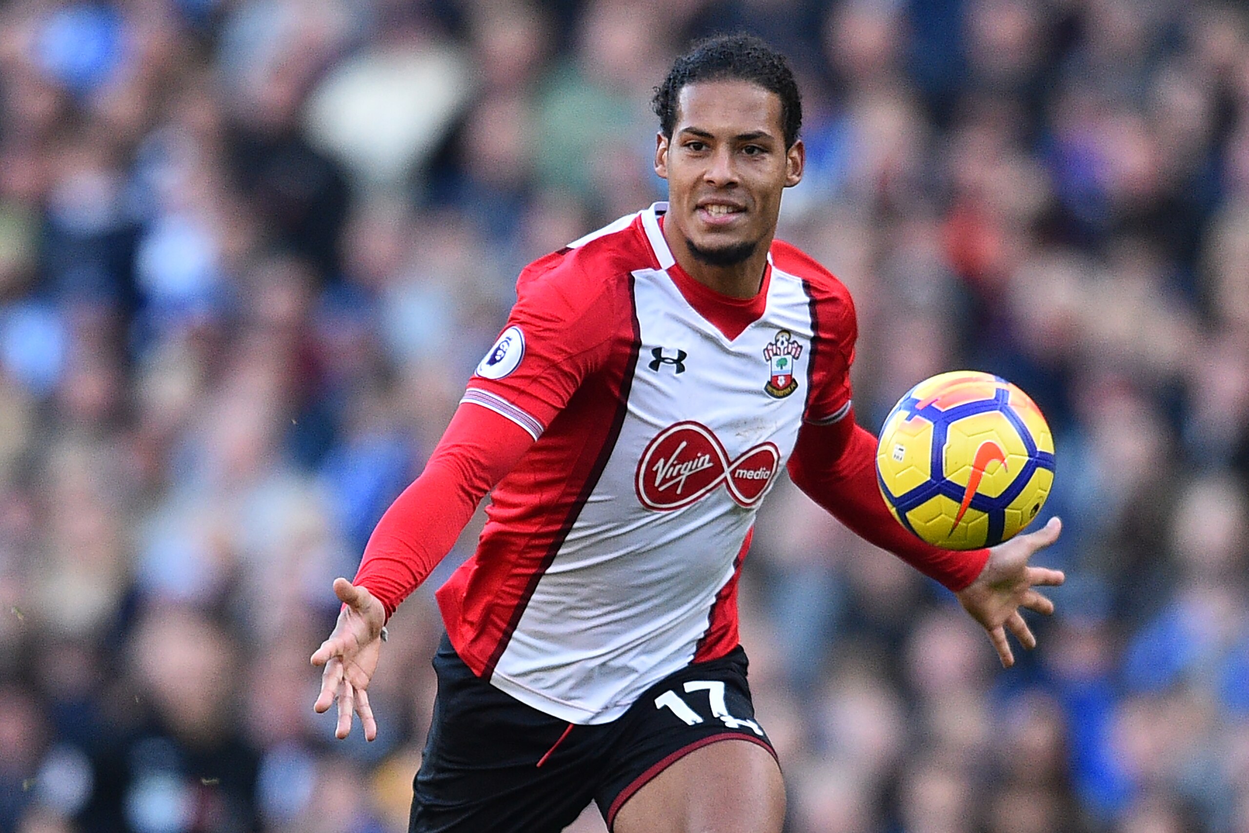 Southampton's Dutch defender Virgil van Dijk chases the ball during the English Premier League football match between Brighton and Hove Albion and Southampton at the American Express Community Stadium in Brighton, southern England on October 29, 2017. / A Southampton's Dutch defender Virgil van Dijk chases the ball during the English Premier League football match between Brighton and Hove Albion and Southampton at the American Express Community Stadium in Brighton, southern England on October 29, 2017. / A