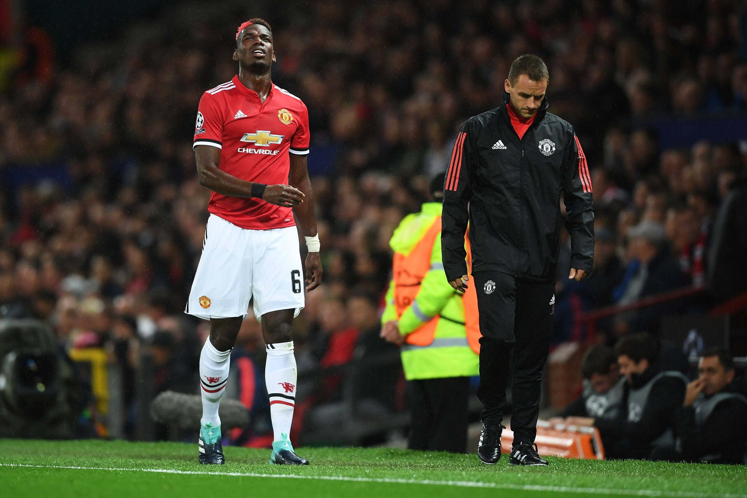 MANCHESTER, ENGLAND - SEPTEMBER 12:  Paul Pogba of ManchesterUnited reacts to being forced off through injury during the UEFA Champions League Group A match between Manchester United and FC Basel at Old Trafford on September 12, 2017 in Manchester, United