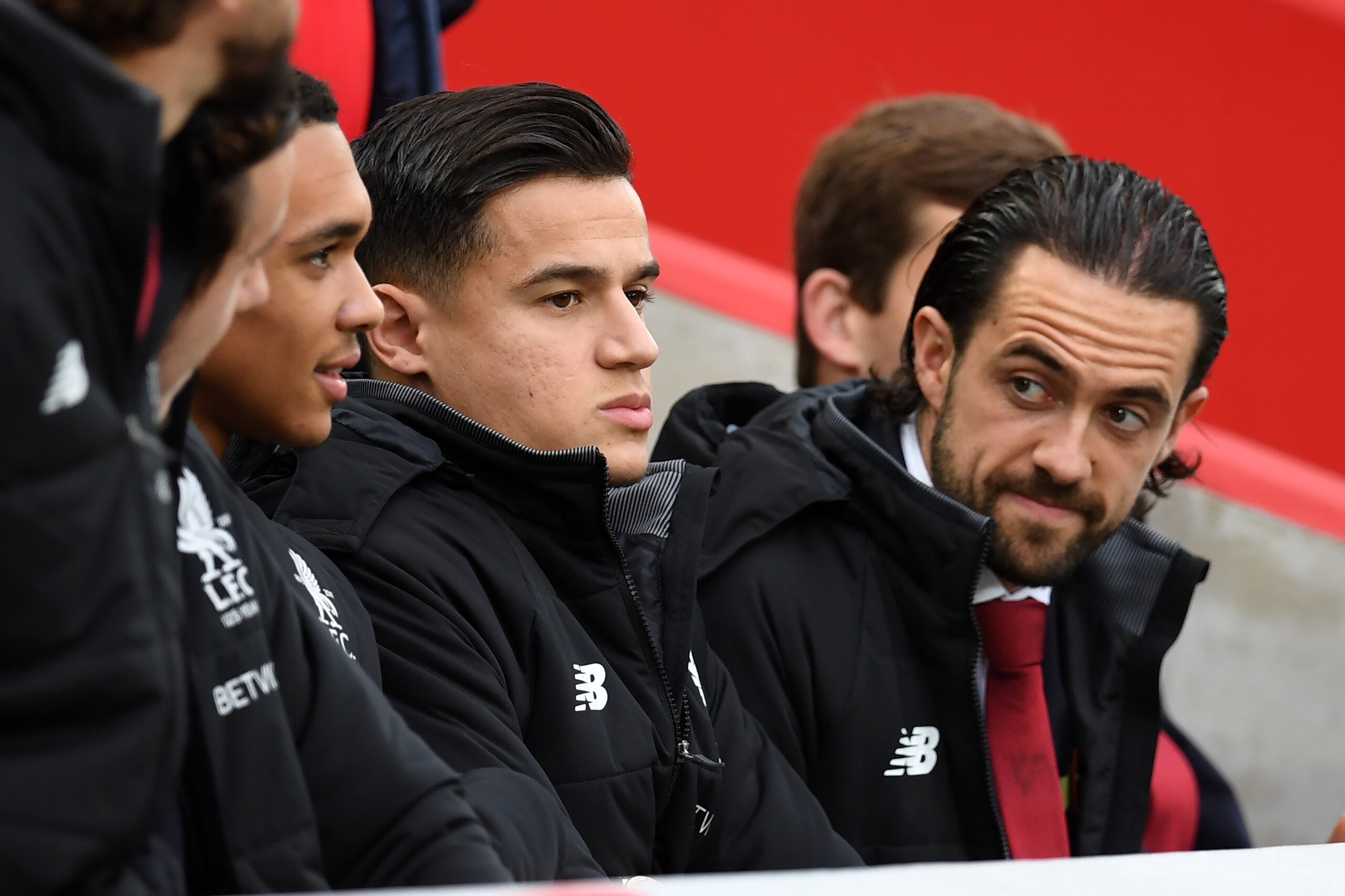 Liverpool's Brazilian midfielder Philippe Coutinho (C) and Liverpool's English striker Danny Ings (R) take their seats for the English Premier League football match between Liverpool and Huddersfield Town at Anfield in Liverpool, north west England on Oct Liverpool's Brazilian midfielder Philippe Coutinho (C) and Liverpool's English striker Danny Ings (R) take their seats for the English Premier League football match between Liverpool and Huddersfield Town at Anfield in Liverpool, north west England on Oct