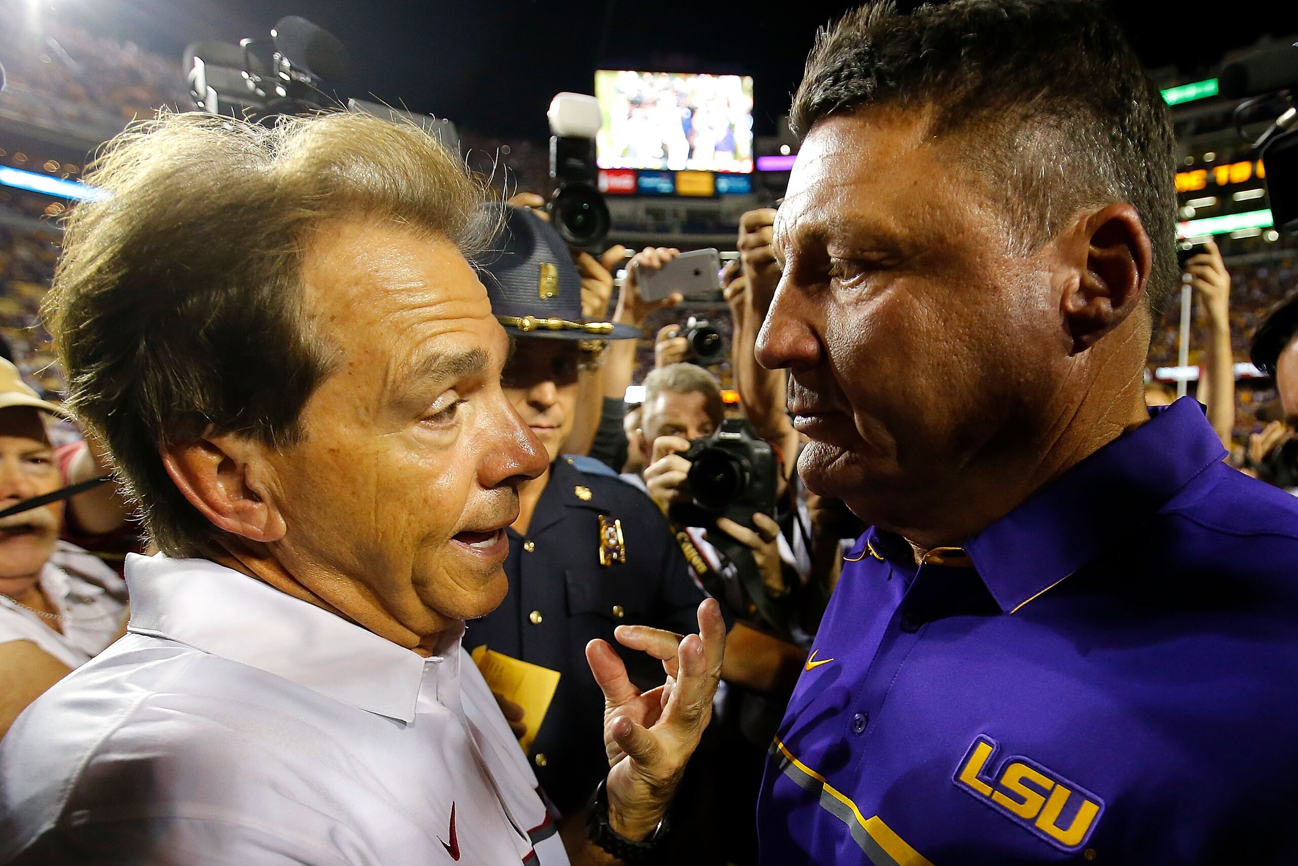 BATON ROUGE, LA - NOVEMBER 05:  Head coach Nick Saban of the Alabama Crimson Tide shakes hands with head coach Ed Orgeron of the LSU Tigers after their 10-0 win at Tiger Stadium on November 5, 2016 in Baton Rouge, Louisiana.  (Photo by Kevin C. Cox/Getty 