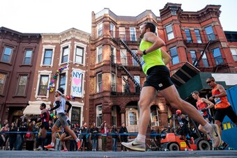 NEW YORK, NY - NOVEMBER 6: Runners make their way east on Lafayette Avenue during the 2016 TCS New York City Marathon, November 6, 2016 in the Clinton Hill neighborhood in the Brooklyn borough of New York City. Established in 1970, the annual race winds t