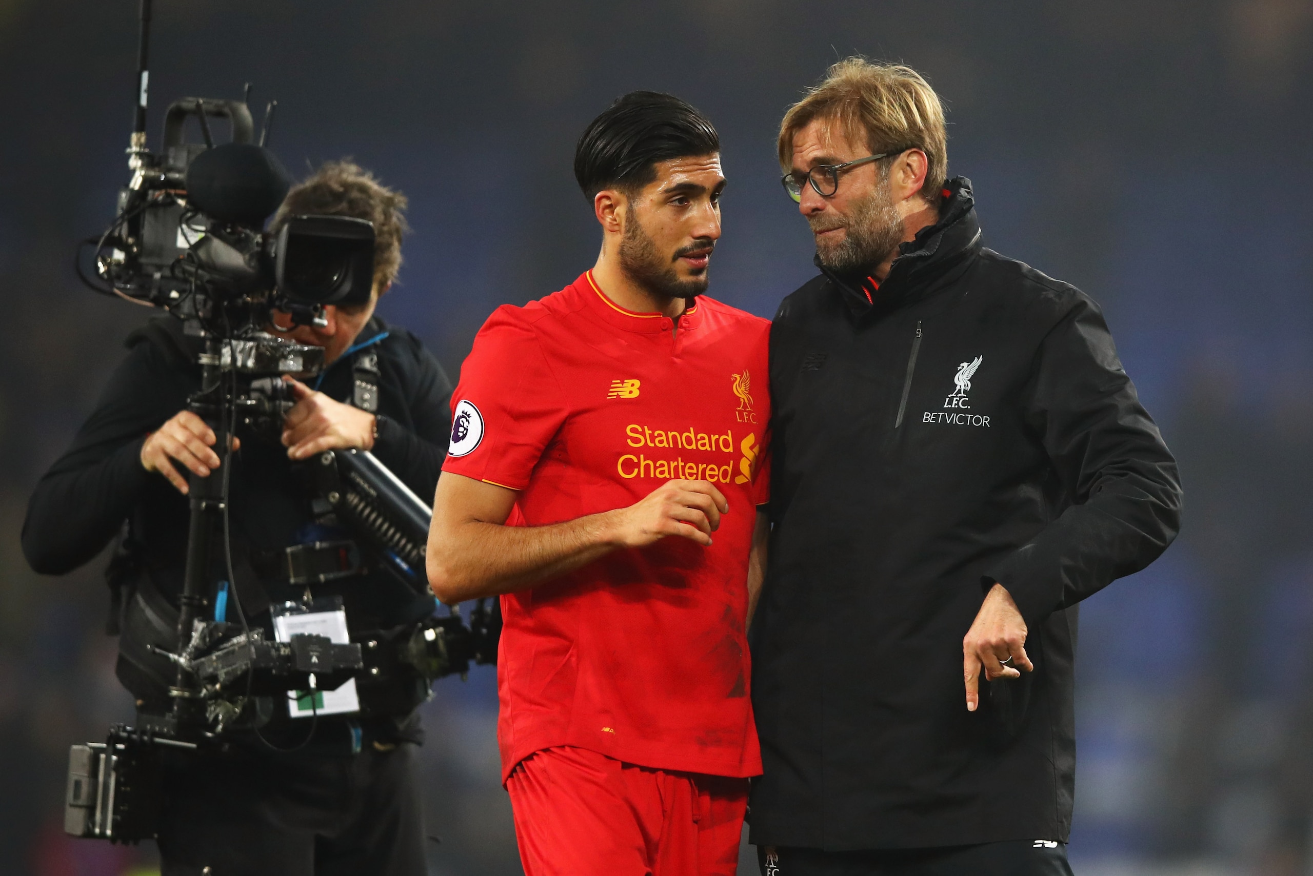 LIVERPOOL, ENGLAND - DECEMBER 19:  Emre Can of Liverpool and Jurgen Klopp manager of Liverpool in discussion as they celebrate victory after the Premier League match between Everton and Liverpool at Goodison Park on December 19, 2016 in Liverpool, England