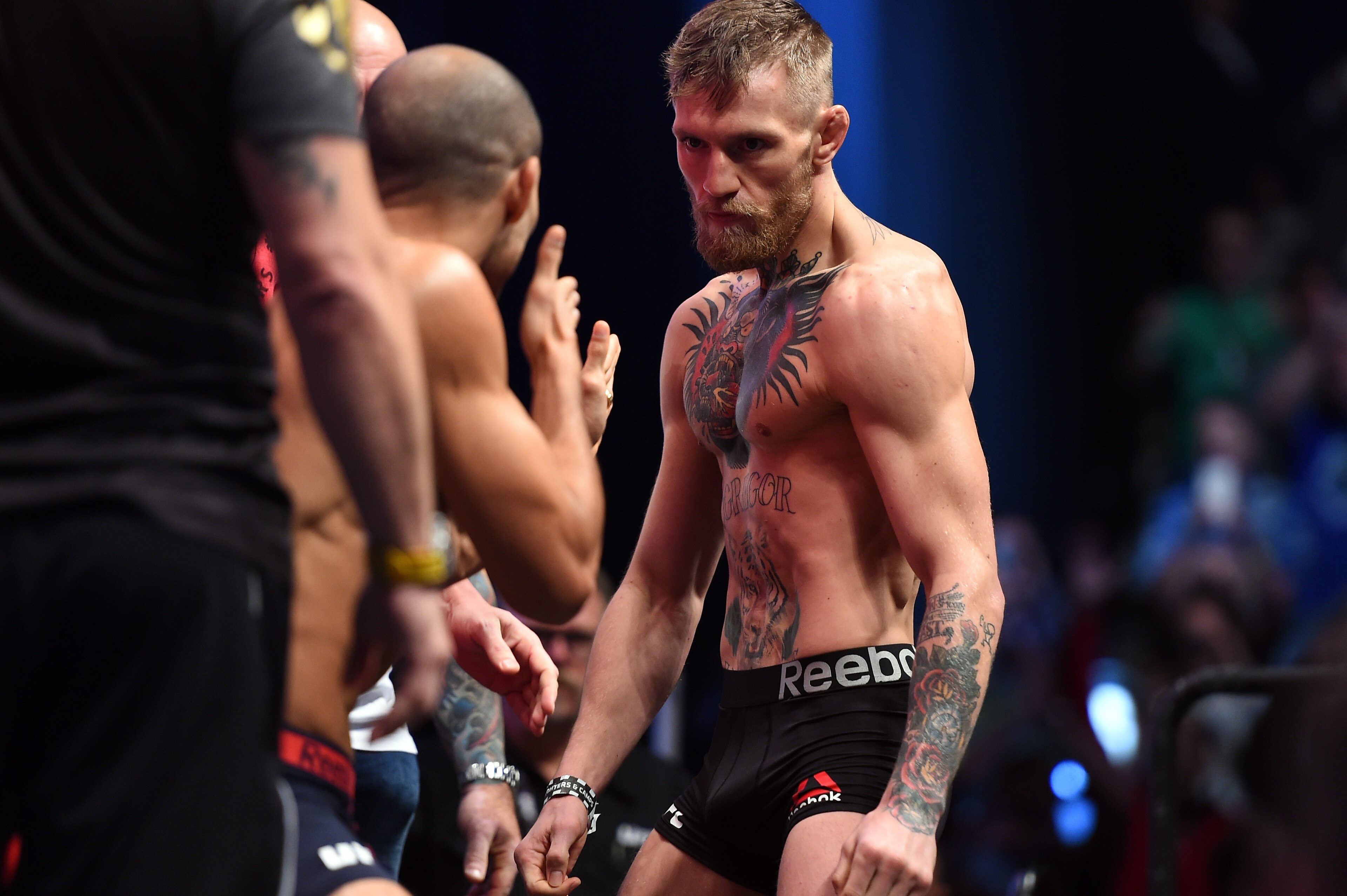 LAS VEGAS, NEVADA - DECEMBER 11:  UFC featherweight champion Jose Aldo of Brazil (L) faces off against Conor McGregor of Ireland (R) during the UFC 194 Weigh-in event at the MGM Grand Garden Arena on December 11, 2015 in Las Vegas, Nevada.  (Photo by Jeff