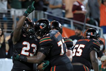 MIAMI GARDENS, FL - NOVEMBER 04:  Christopher Herndon IV #23 of the Miami Hurricanes celebrates a touchdown during a game against the Virginia Tech Hokies at Hard Rock Stadium on November 4, 2017 in Miami Gardens, Florida.  (Photo by Mike Ehrmann/Getty Im