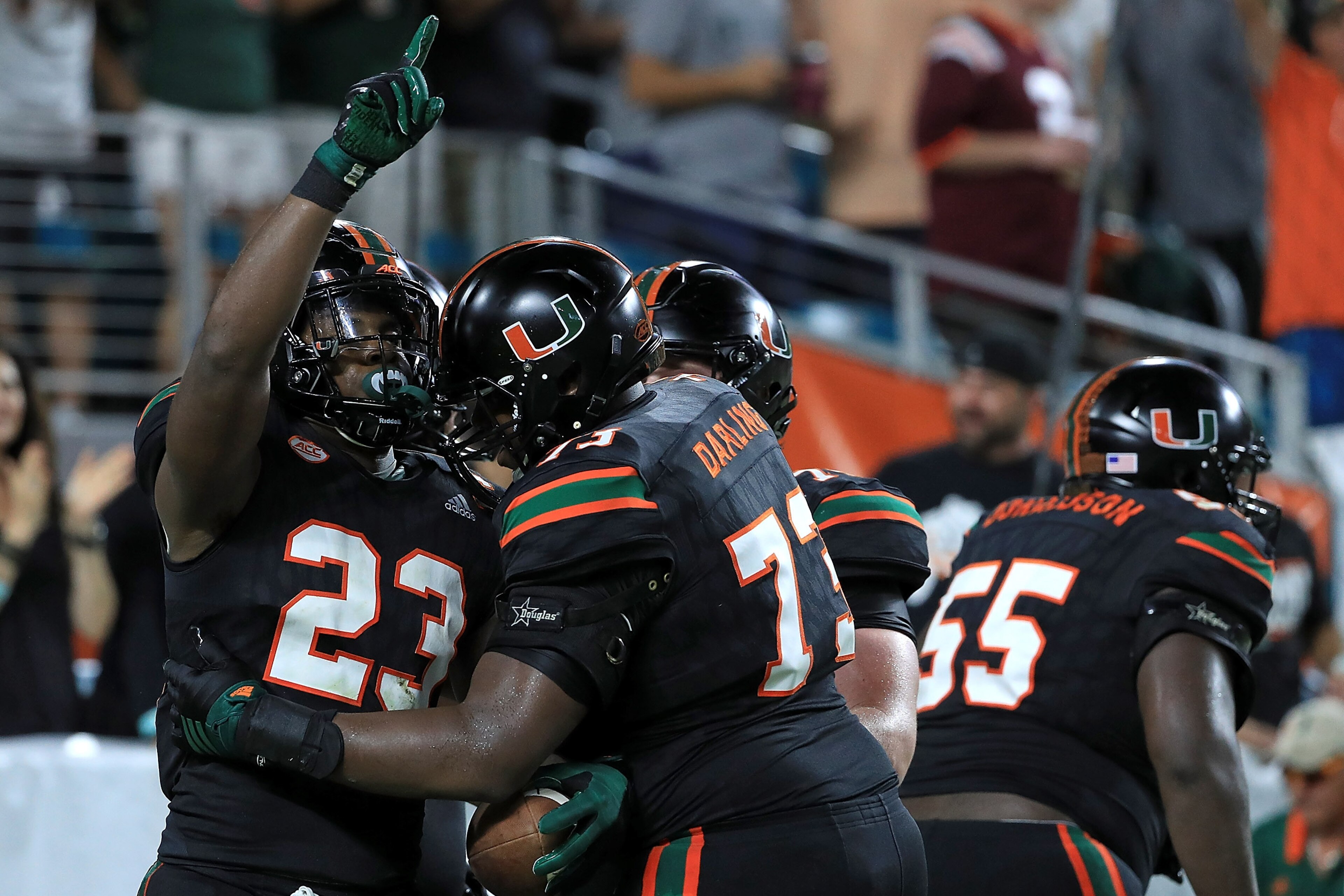MIAMI GARDENS, FL - NOVEMBER 04: Christopher Herndon IV #23 of the Miami Hurricanes celebrates a touchdown during a game against the Virginia Tech Hokies at Hard Rock Stadium on November 4, 2017 in Miami Gardens, Florida. (Photo by Mike Ehrmann/Getty Im MIAMI GARDENS, FL - NOVEMBER 04: Christopher Herndon IV #23 of the Miami Hurricanes celebrates a touchdown during a game against the Virginia Tech Hokies at Hard Rock Stadium on November 4, 2017 in Miami Gardens, Florida. (Photo by Mike Ehrmann/Getty Im