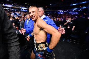 NEW YORK, NY - NOVEMBER 04: TJ Dillashaw
smiles after his victory over Cody Garbrandt in their UFC bantamweight championship bout during the UFC 217 event at Madison Square Garden on November 4, 2017 in New York City.  (Photo by Jeff Bottari/Zuffa LLC/Zuf