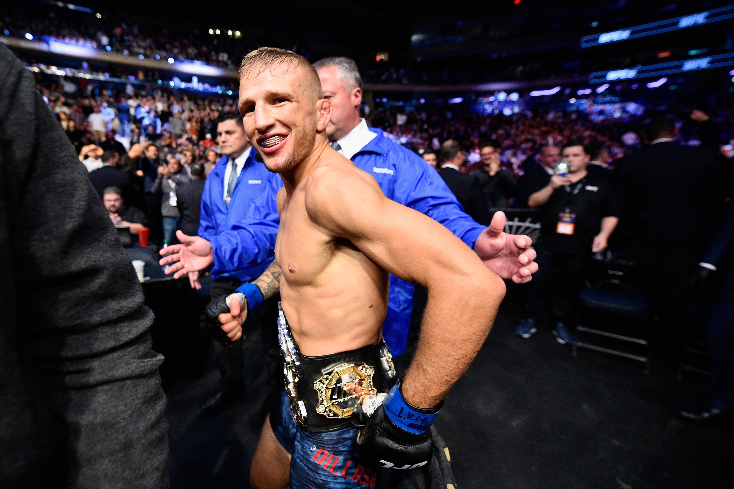 NEW YORK, NY - NOVEMBER 04: TJ Dillashaw
smiles after his victory over Cody Garbrandt in their UFC bantamweight championship bout during the UFC 217 event at Madison Square Garden on November 4, 2017 in New York City.  (Photo by Jeff Bottari/Zuffa LLC/Zuf