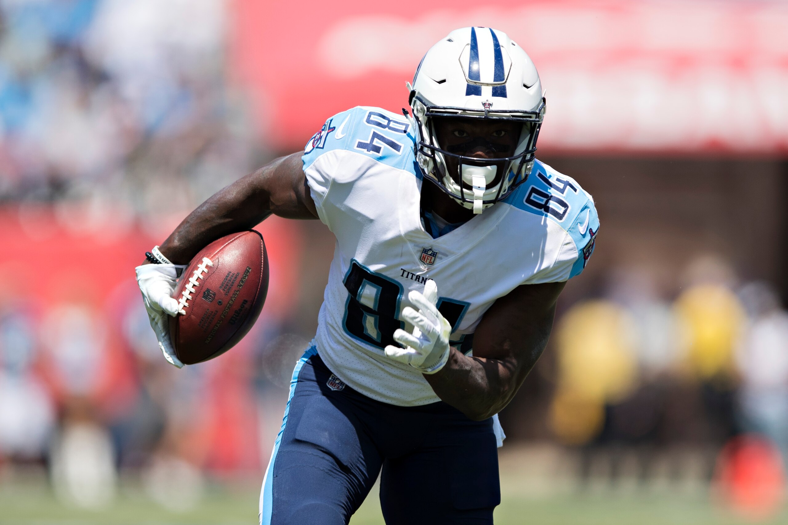 NASHVILLE, TN - SEPTEMBER 10:  Corey Davis #84 of the Tennessee Titans runs the ball during a game against the Oakland Raiders at Nissan Stadium on September 10, 2017 in Nashville, Tennessee.  The Raiders defeated the Titans 26-16.  (Photo by Wesley Hitt/