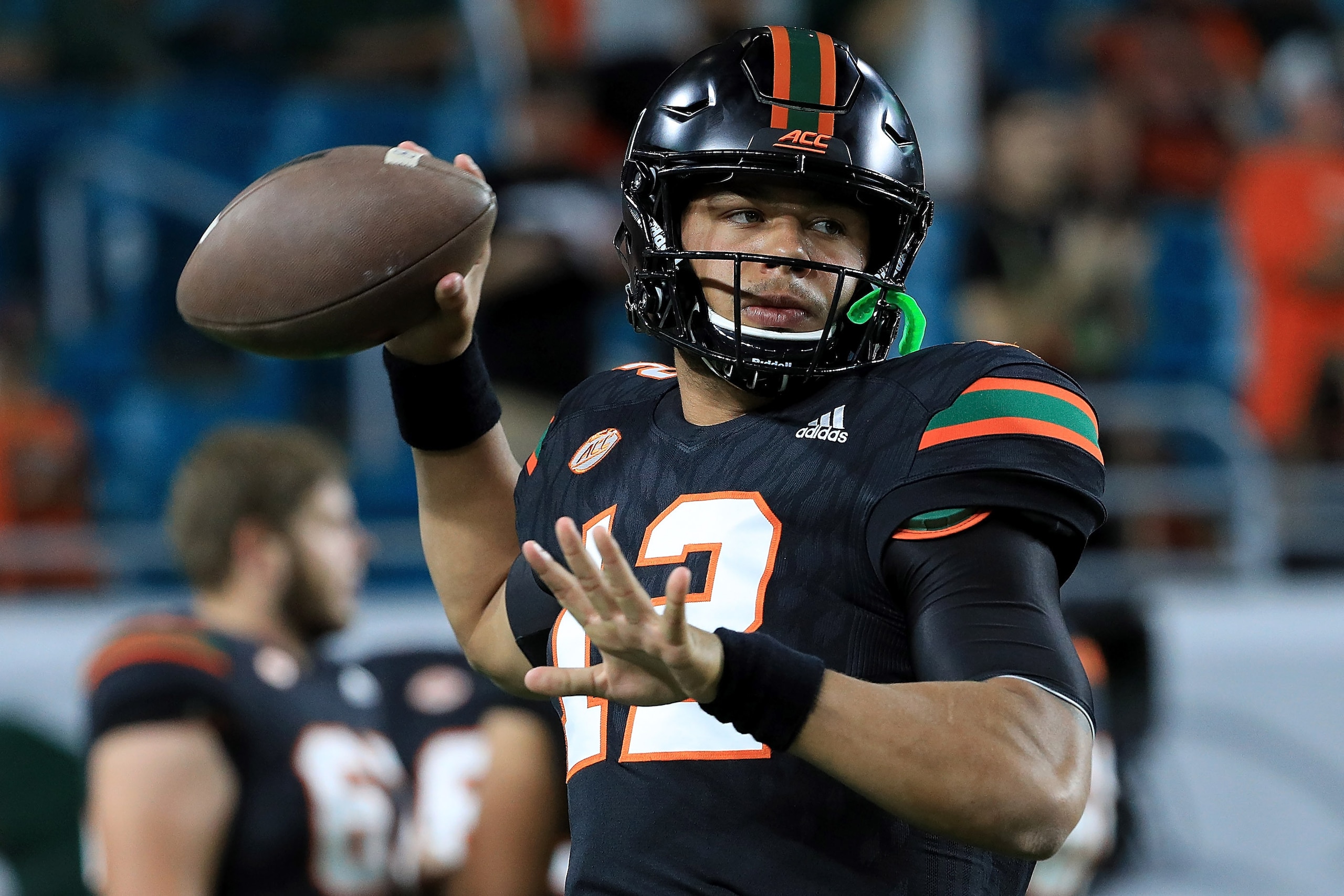 MIAMI GARDENS, FL - NOVEMBER 04:  Malik Rosier #12 of the Miami Hurricanes  warms up during a game against the Virginia Tech Hokies at Hard Rock Stadium on November 4, 2017 in Miami Gardens, Florida.  (Photo by Mike Ehrmann/Getty Images)