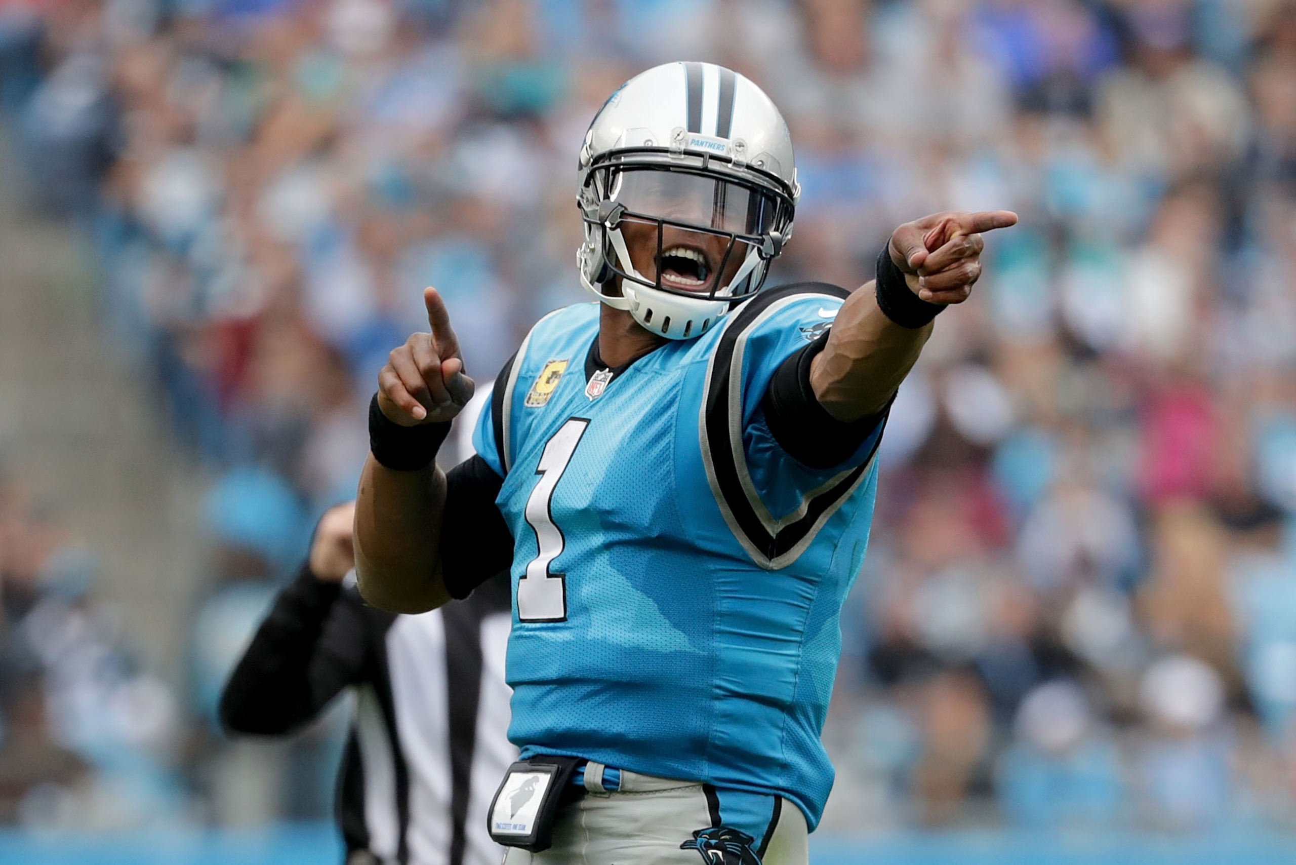 CHARLOTTE, NC - NOVEMBER 05:  Cam Newton #1 of the Carolina Panthers signals a first down against the Atlanta Falcons in the second half during their game at Bank of America Stadium on November 5, 2017 in Charlotte, North Carolina.  (Photo by Streeter Lec