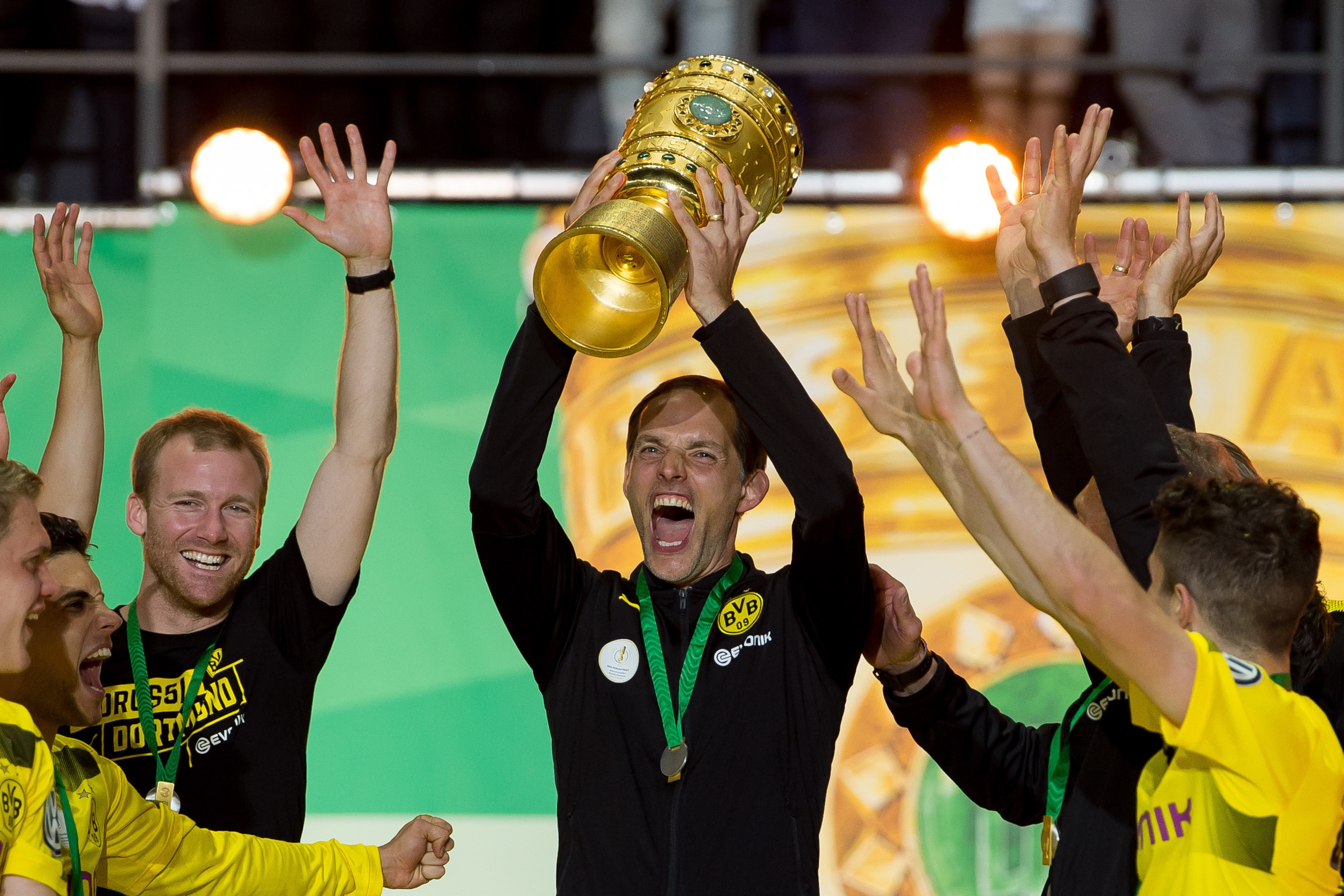 BERLIN, GERMANY - MAY 27: Head coach Thomas Tuchel of Dortmund celebrates with the trophy after winning the DFB Cup final match between Eintracht Frankfurt and Borussia Dortmund at Olympiastadion on May 27, 2017 in Berlin, Germany. (Photo by TF-Images/Get