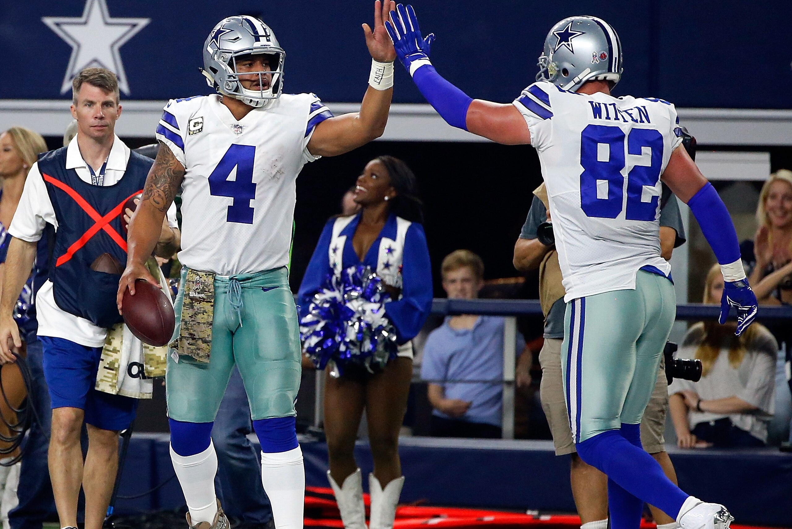 ARLINGTON, TX - NOVEMBER 05: Dak Prescott #4 of the Dallas Cowboys gets a high five from Terrance Williams #83 of the Dallas Cowboys after scrabling for a first down in the second half of a football game against the Kansas City Chiefs at AT&T Stadium on ARLINGTON, TX - NOVEMBER 05: Dak Prescott #4 of the Dallas Cowboys gets a high five from Terrance Williams #83 of the Dallas Cowboys after scrabling for a first down in the second half of a football game against the Kansas City Chiefs at AT&T Stadium on