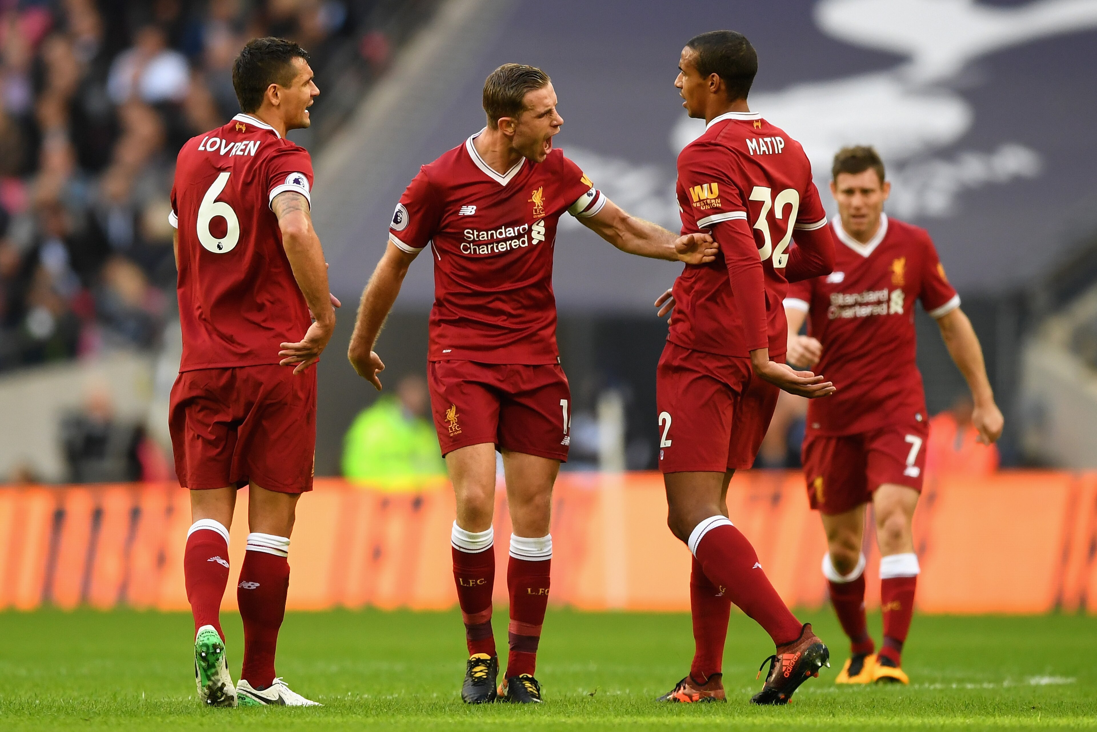 LONDON, ENGLAND - OCTOBER 22: Jordan Henderson of Liverpool argues with Dejan Lovren of Liverpool and Joel Matip of Liverpool during the Premier League match between Tottenham Hotspur and Liverpool at Wembley Stadium on October 22, 2017 in London, England