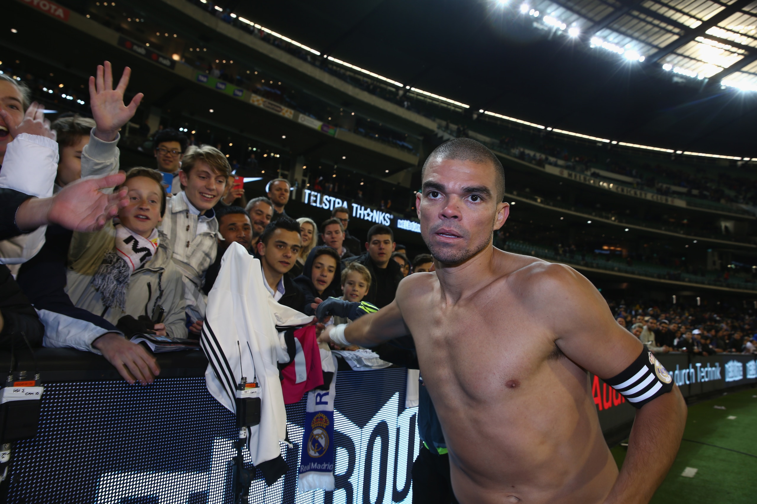 MELBOURNE, AUSTRALIA - JULY 18:  Pepe of Real Madrid signs autographs for fans after the International Champions Cup friendly match between Real Madrid and AS Roma at the Melbourne Cricket Ground on July 18, 2015 in Melbourne, Australia.  (Photo by Robert