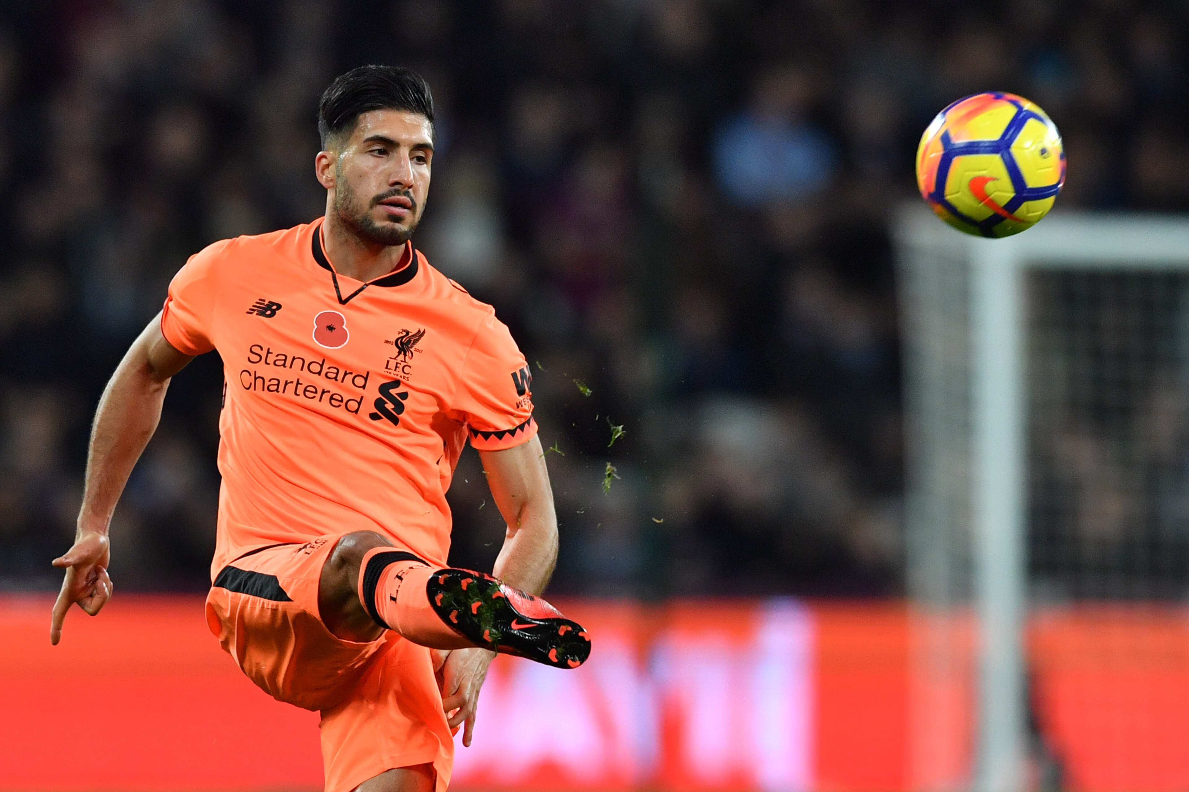 Liverpool's German midfielder Emre Can passes the ball during the English Premier League football match between West Ham United and Liverpool at The London Stadium, in east London on November 4, 2017. / AFP PHOTO / Ben STANSALL / RESTRICTED TO EDITORIAL U