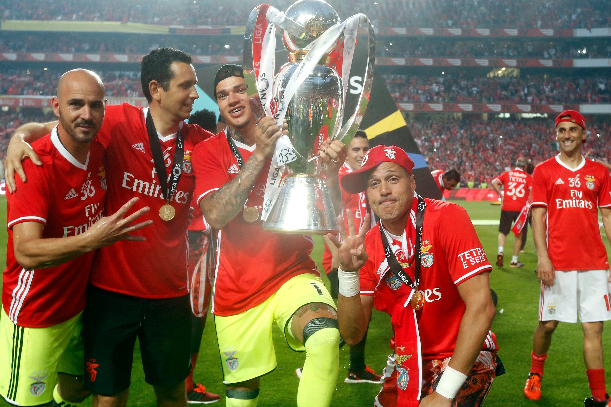 Ederson celebrates the Liga title with his friend and compatriot, Julio Cesar