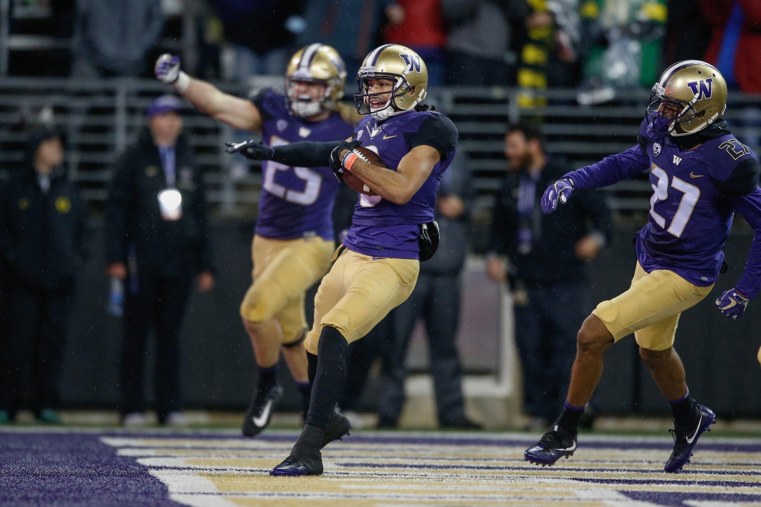 SEATTLE, WA - NOVEMBER 04:  Punt returner Dante Pettis #8 of the Washington Huskies celebrates after retuning a punt for a touchdown against the Oregon Ducks at Husky Stadium on November 4, 2017 in Seattle, Washington. The return for a touchdown was the n