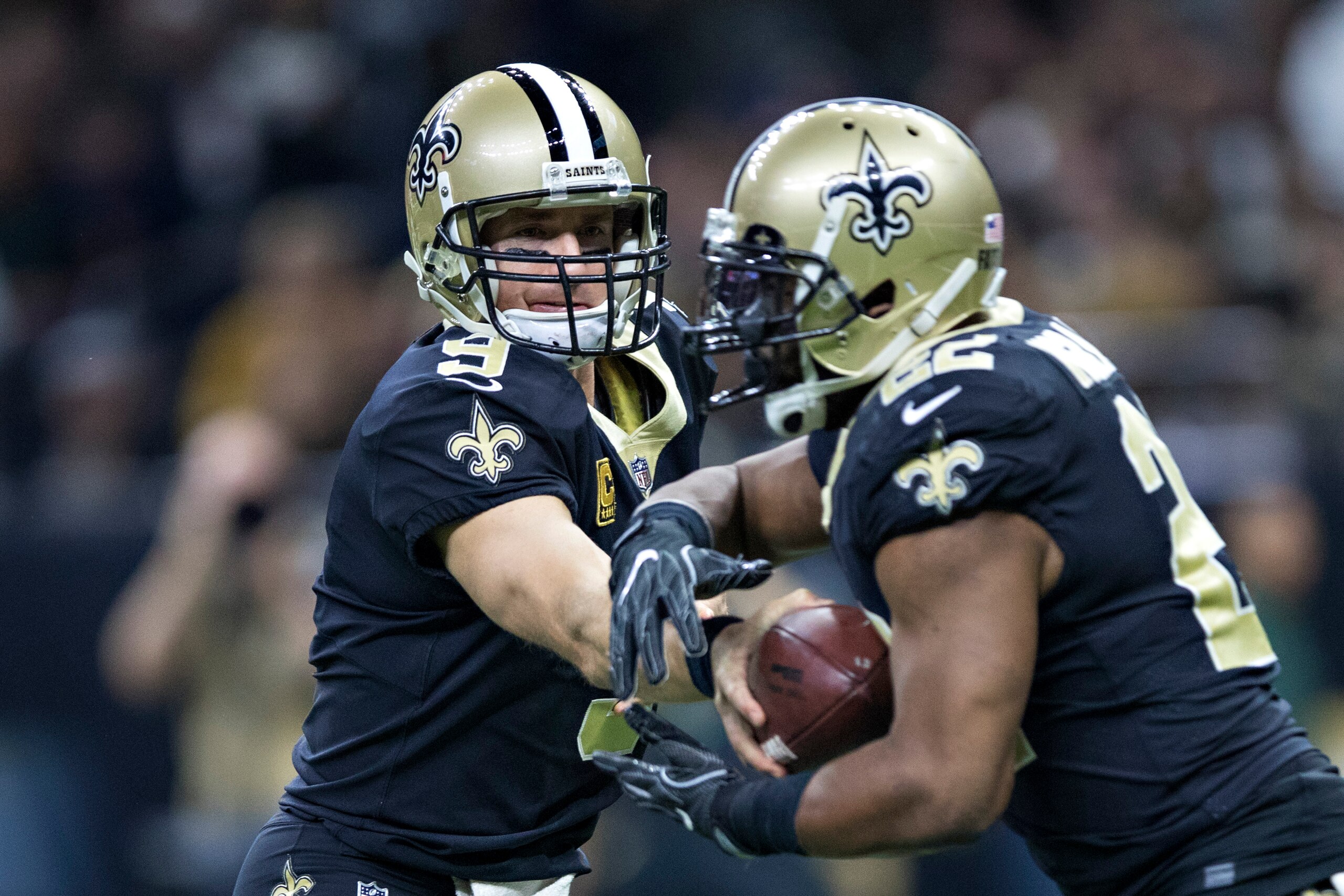 NEW ORLEANS, LA - OCTOBER 29:  Drew Brees #9 hands off the ball to Mark Ingram II #22 of the New Orleans Saints during a game against the Chicago Bears at Mercedes-Benz Superdome on October 29, 2017 in New Orleans, Louisiana.  The Saints defeated the Bear