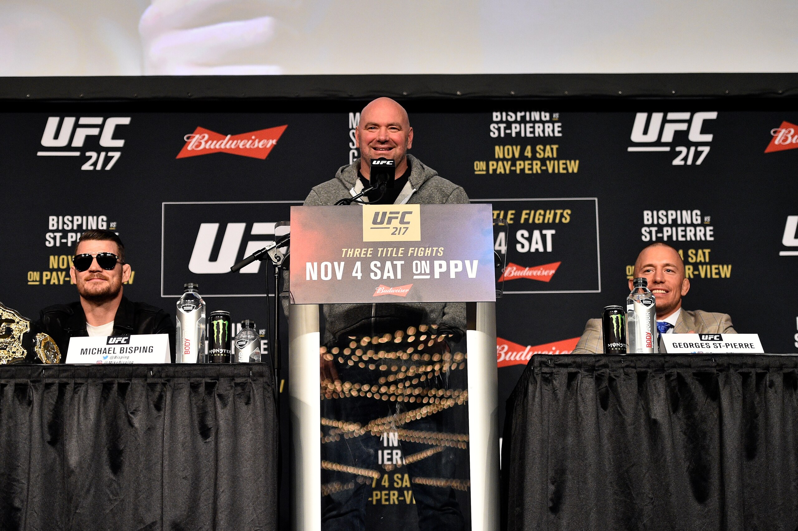 NEW YORK, NY - NOVEMBER 02: UFC President Dana White moderates questions between fighters Michael Bisping of England (L) and Georges St-Pierre of Canada (R) during the UFC 217 Press Conference inside Madison Square Garden on November 2, 2017 in New York NEW YORK, NY - NOVEMBER 02: UFC President Dana White moderates questions between fighters Michael Bisping of England (L) and Georges St-Pierre of Canada (R) during the UFC 217 Press Conference inside Madison Square Garden on November 2, 2017 in New York