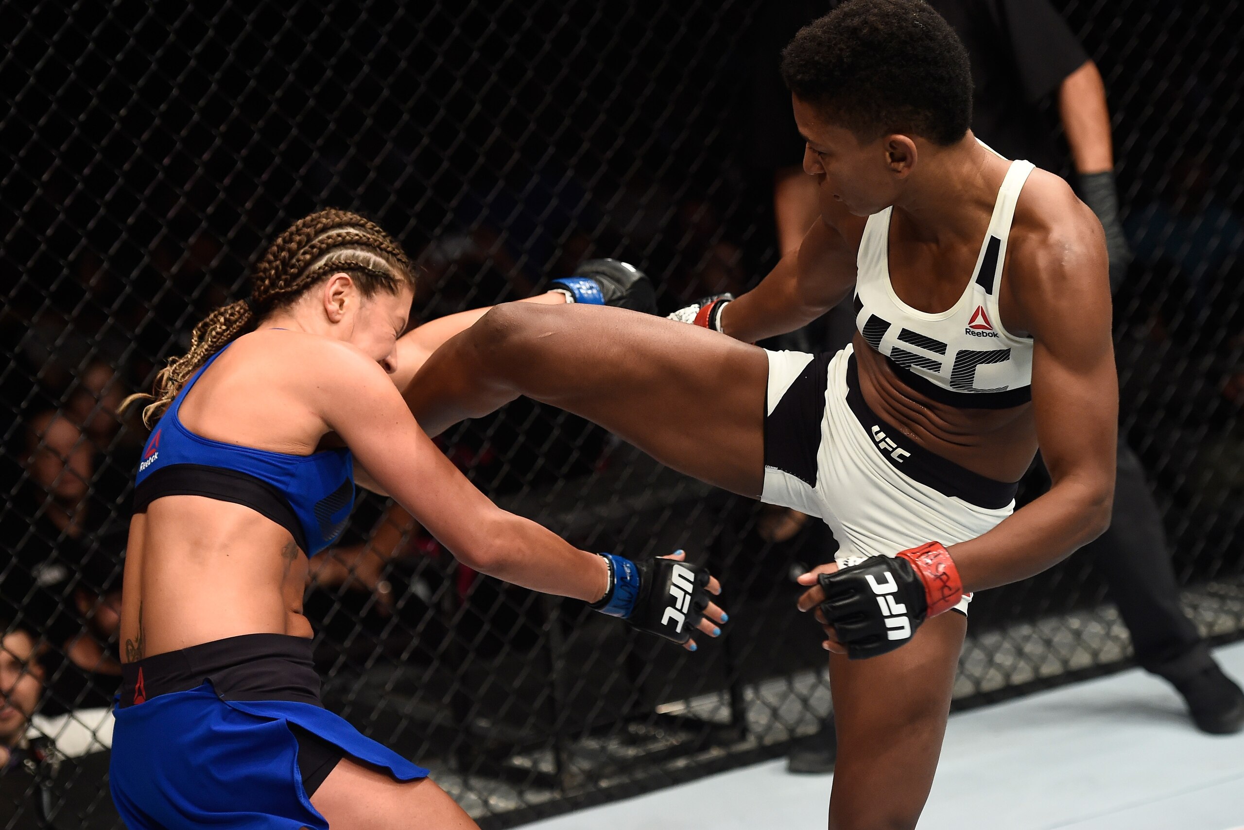 LAS VEGAS, NV - JULY 07: (R-L) Angela Hill kicks Ashley Yoder in their women's strawweight bout during The Ultimate Fighter Finale at T-Mobile Arena on July 7, 2017 in Las Vegas, Nevada. (Photo by Brandon Magnus/Zuffa LLC/Zuffa LLC via Getty Images) LAS VEGAS, NV - JULY 07: (R-L) Angela Hill kicks Ashley Yoder in their women's strawweight bout during The Ultimate Fighter Finale at T-Mobile Arena on July 7, 2017 in Las Vegas, Nevada. (Photo by Brandon Magnus/Zuffa LLC/Zuffa LLC via Getty Images)
